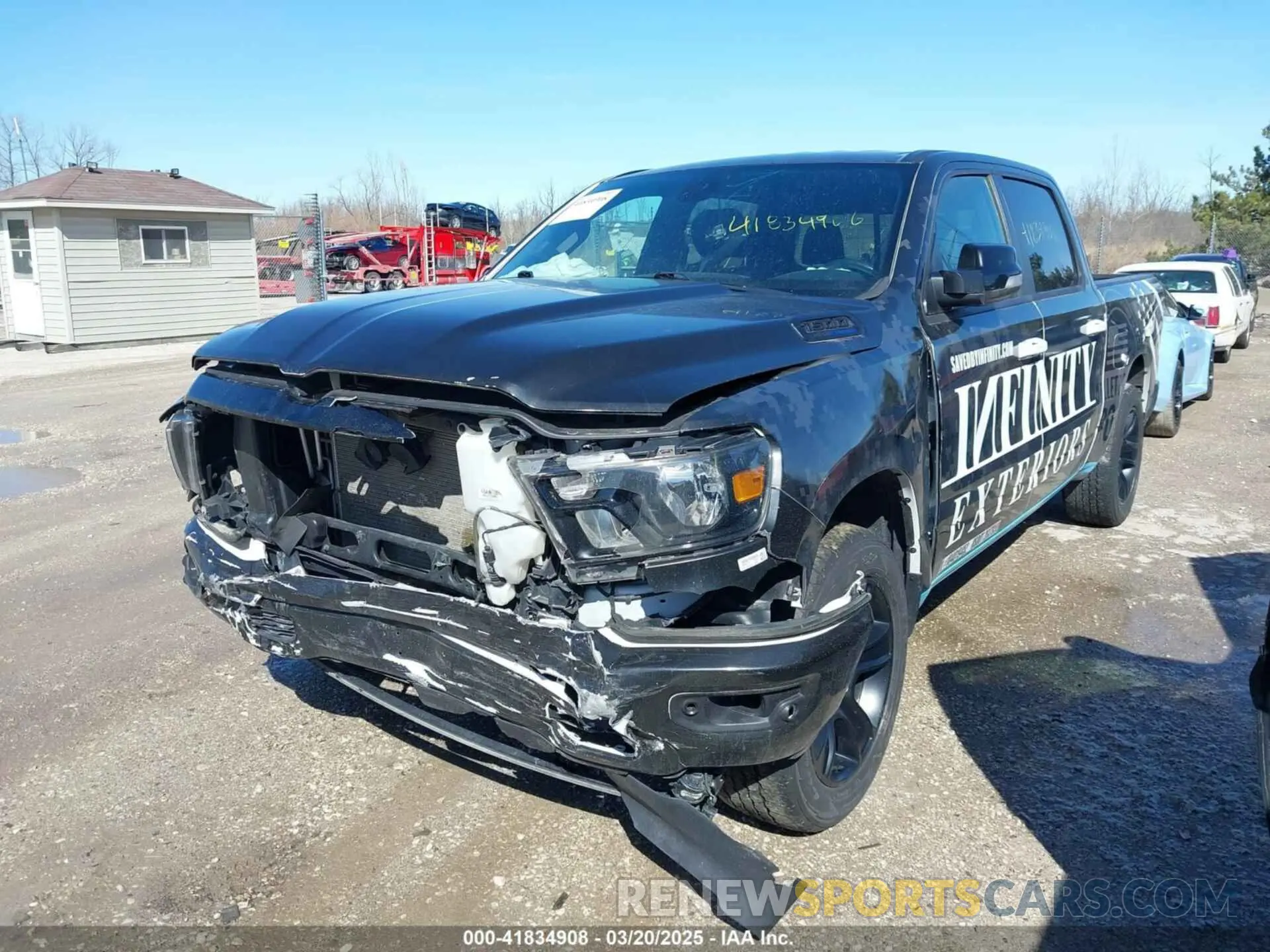 2 Photograph of a damaged car 1C6SRFFT8MN598163 RAM 1500 2021