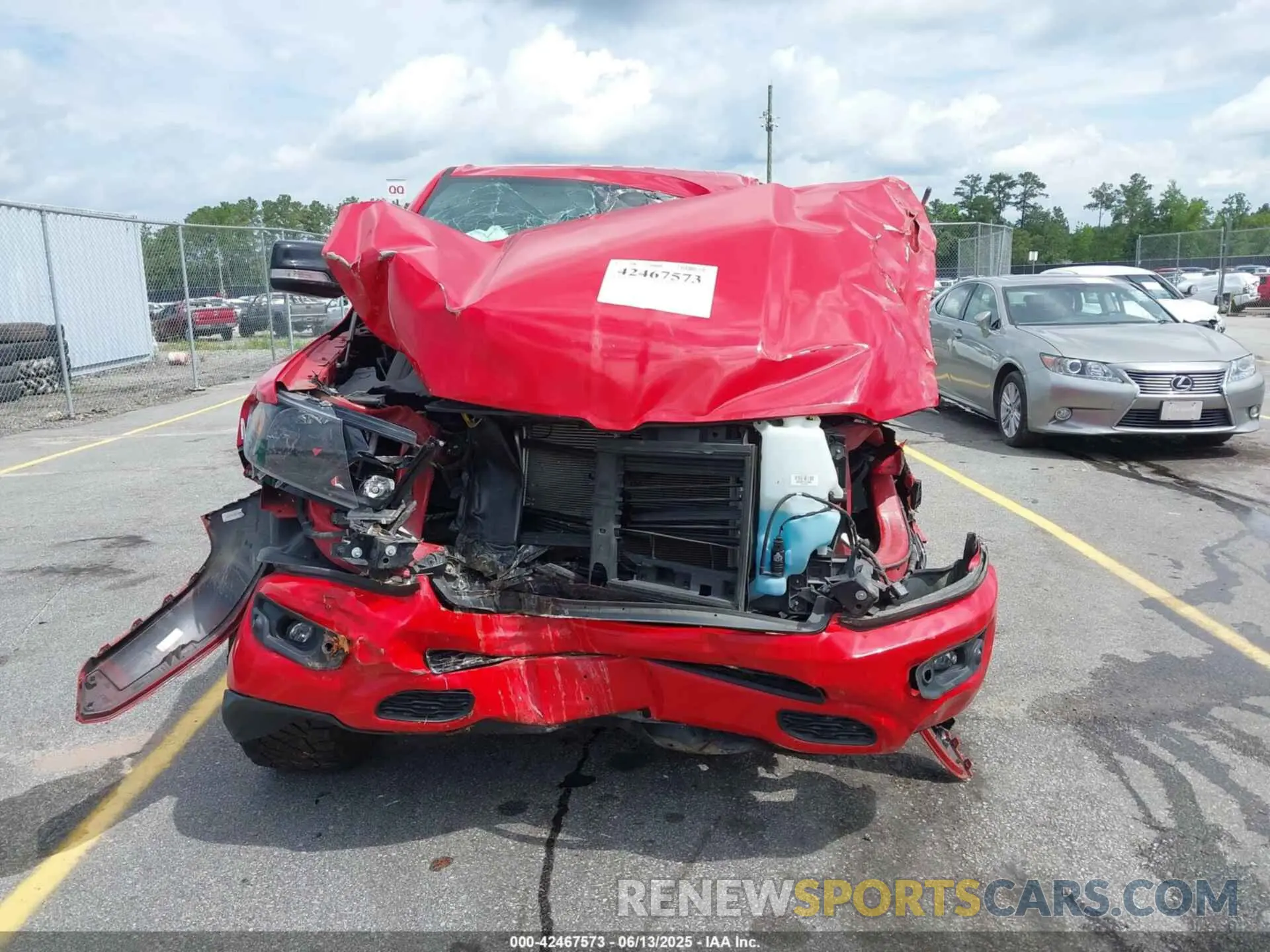 12 Photograph of a damaged car 1C6SRFFT8MN622915 RAM 1500 2021