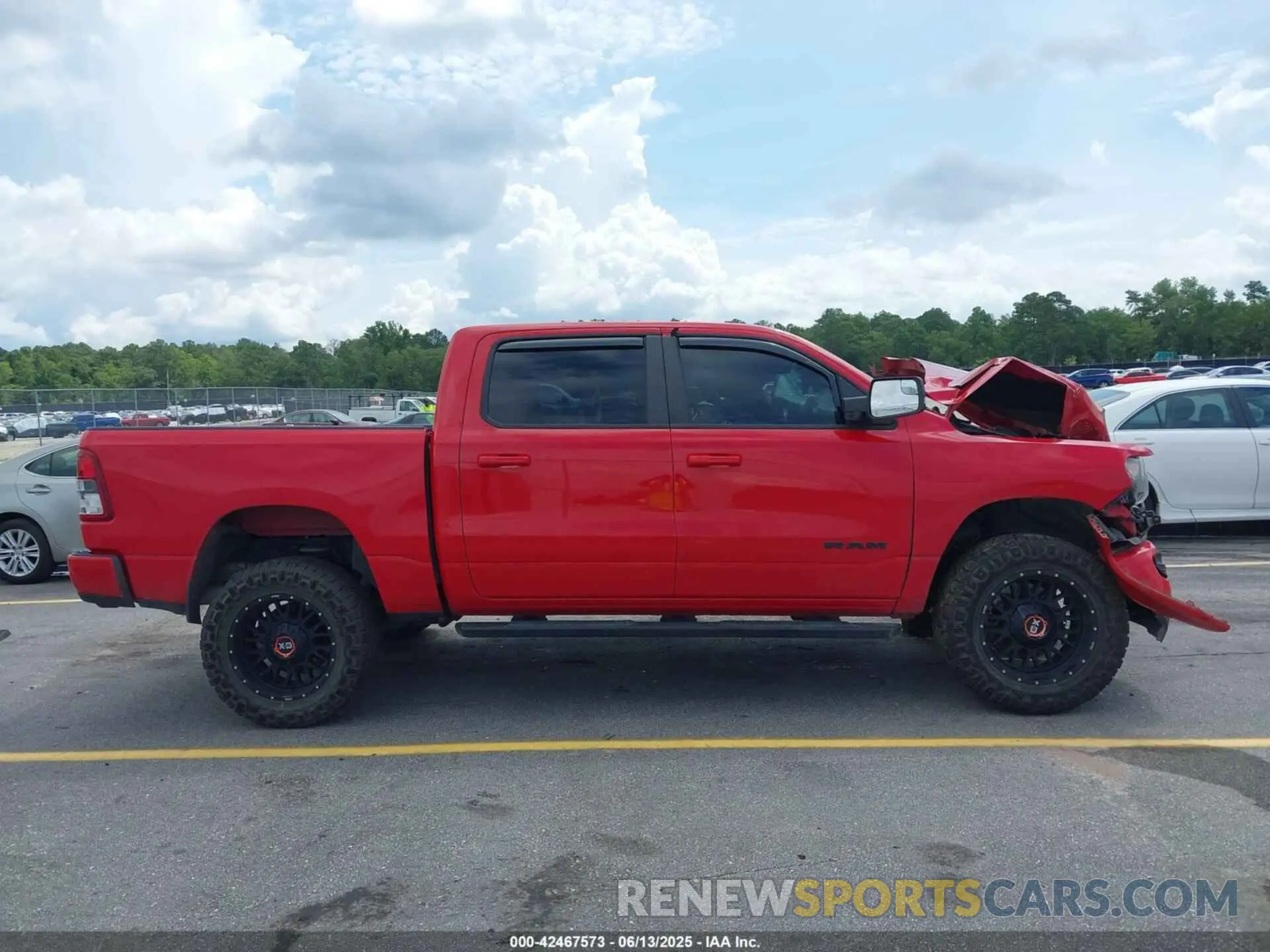 13 Photograph of a damaged car 1C6SRFFT8MN622915 RAM 1500 2021