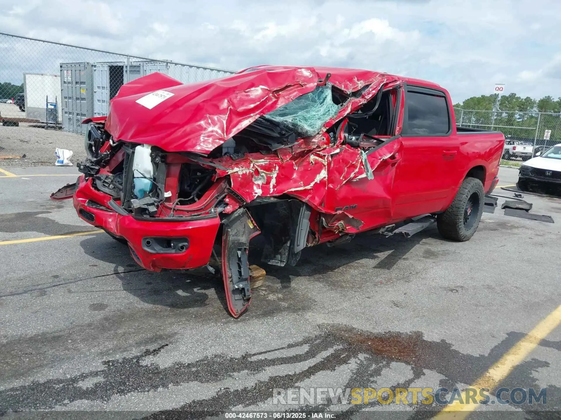 2 Photograph of a damaged car 1C6SRFFT8MN622915 RAM 1500 2021