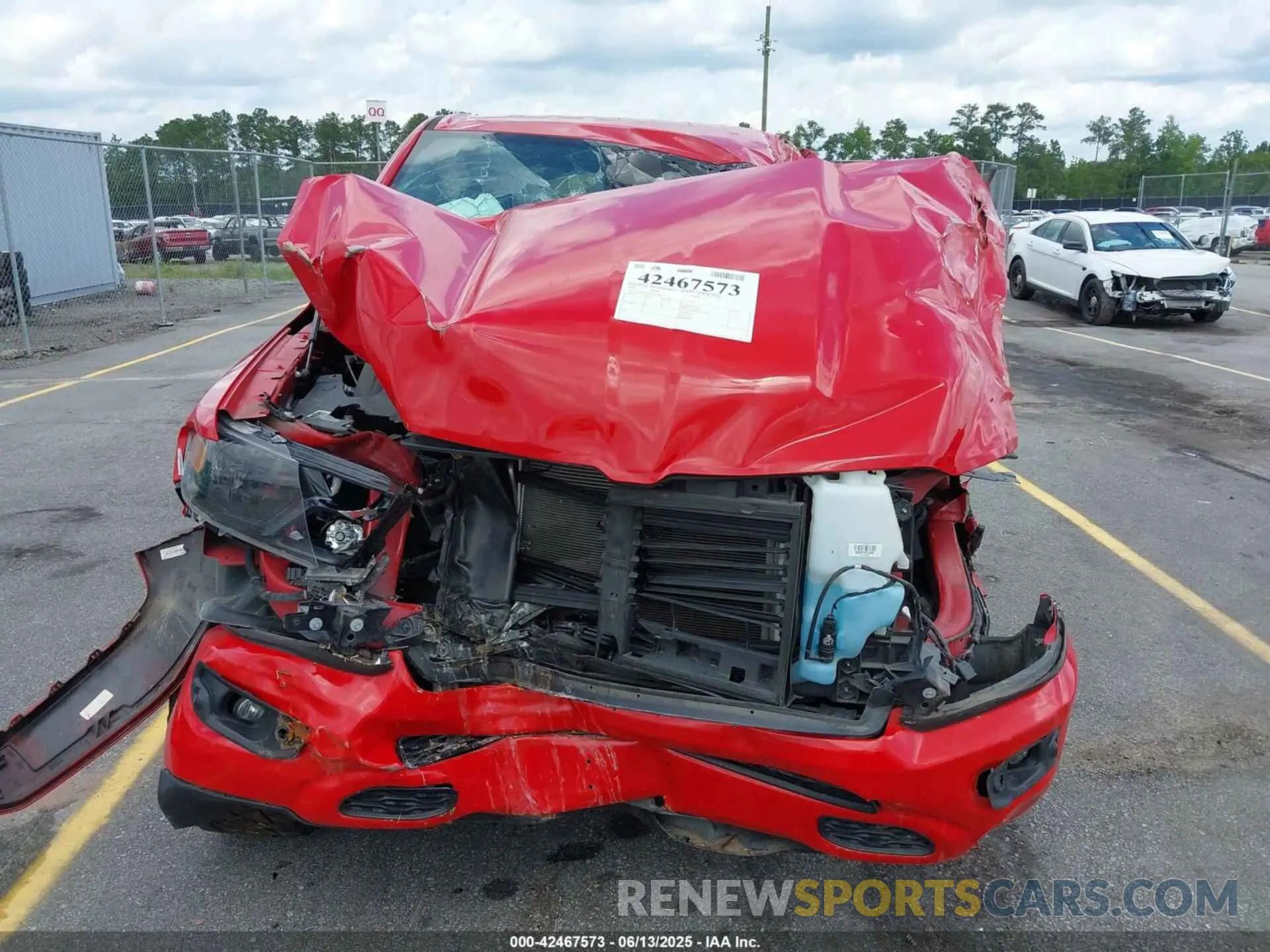 6 Photograph of a damaged car 1C6SRFFT8MN622915 RAM 1500 2021