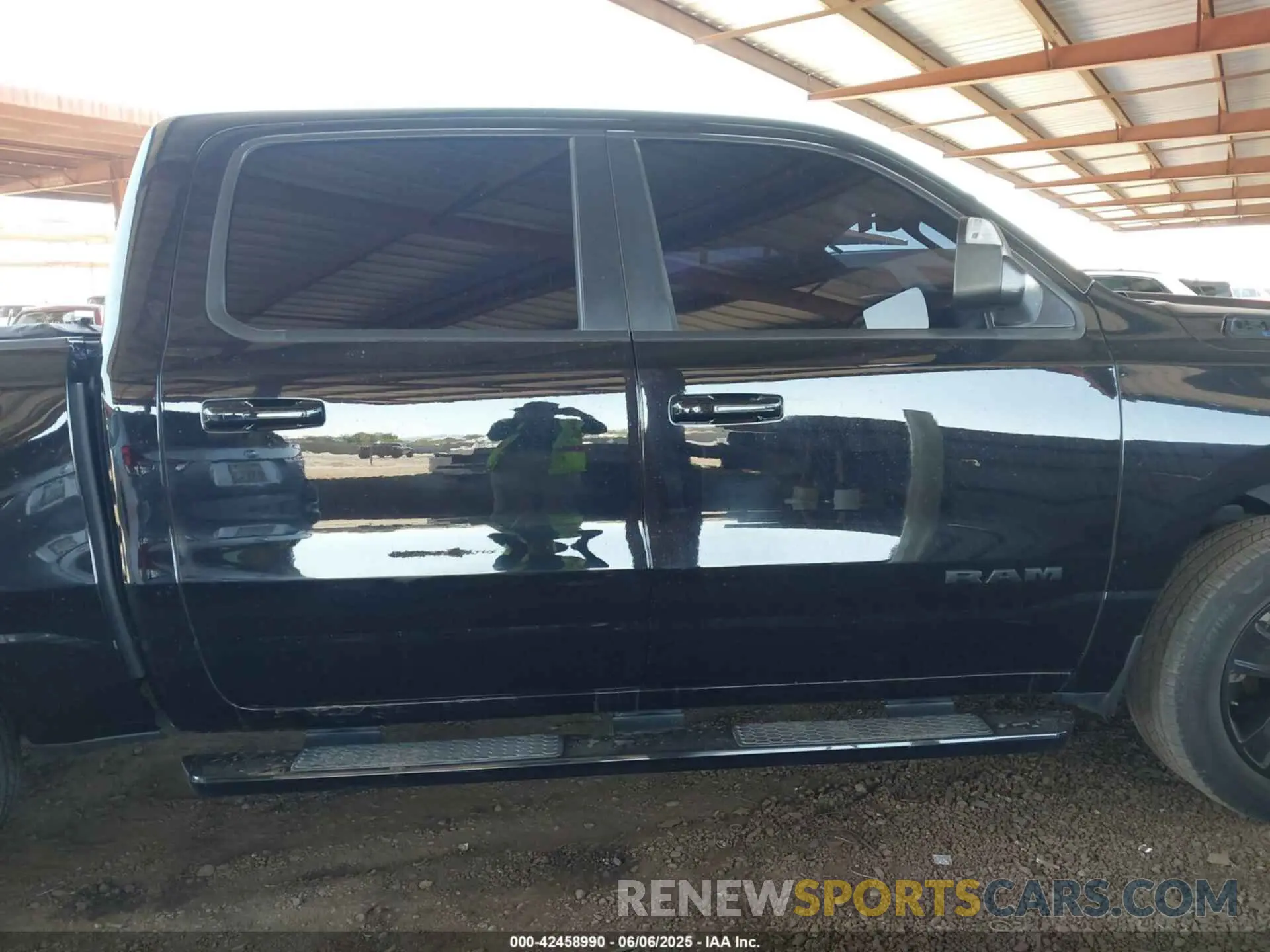 13 Photograph of a damaged car 1C6SRFFT8MN658975 RAM 1500 2021