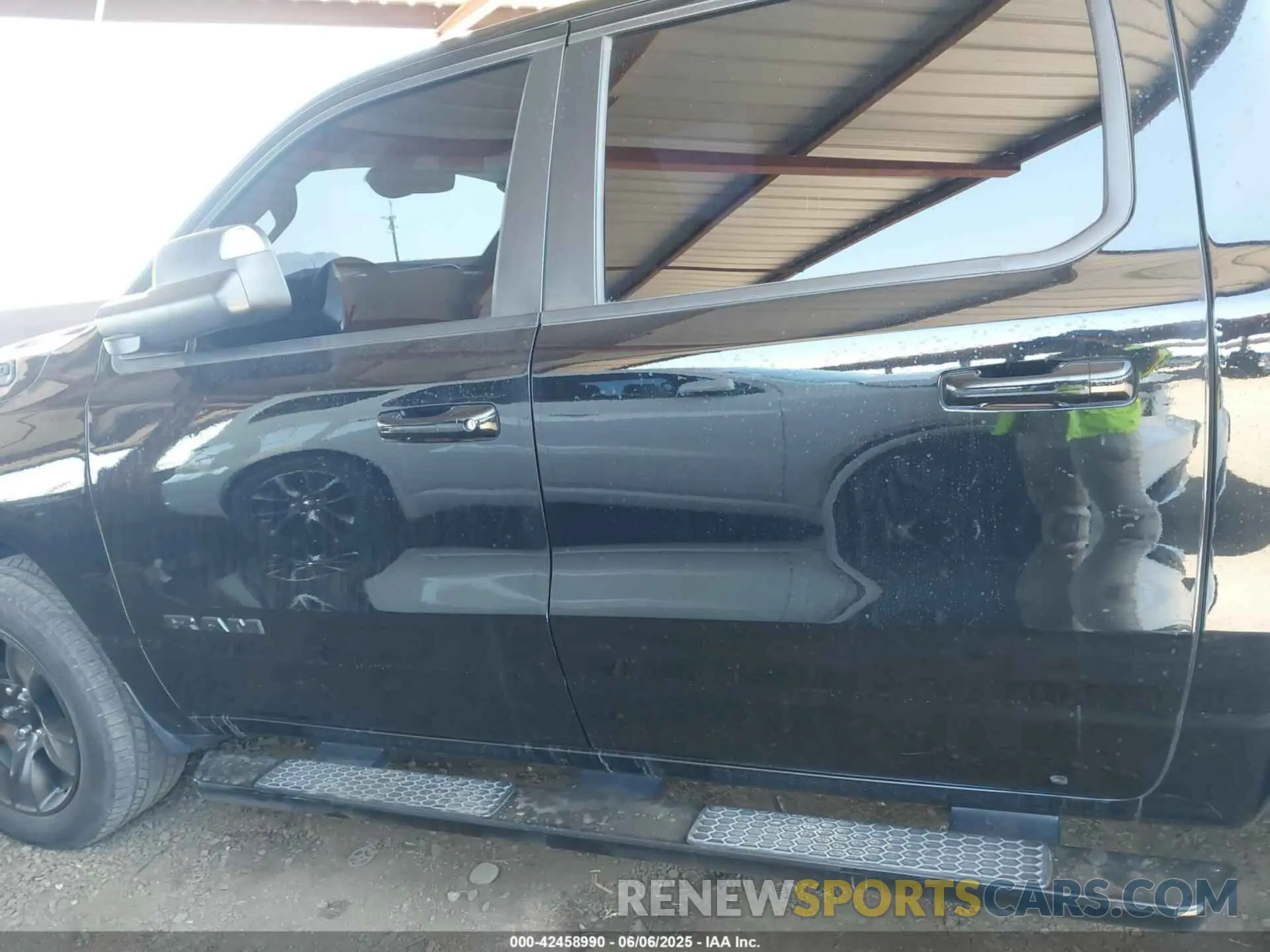 14 Photograph of a damaged car 1C6SRFFT8MN658975 RAM 1500 2021