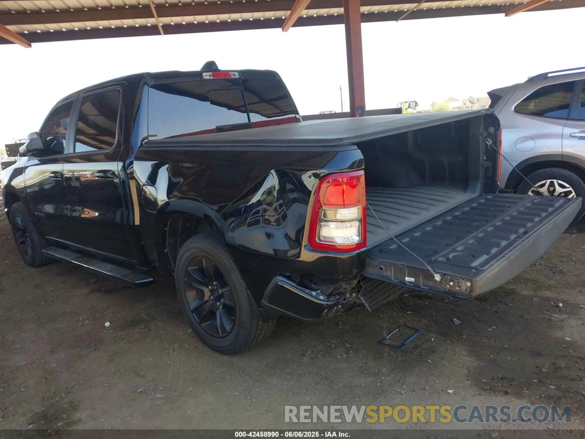 3 Photograph of a damaged car 1C6SRFFT8MN658975 RAM 1500 2021