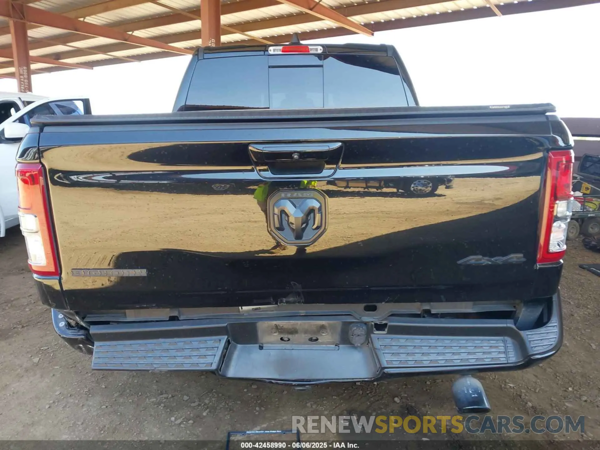 6 Photograph of a damaged car 1C6SRFFT8MN658975 RAM 1500 2021