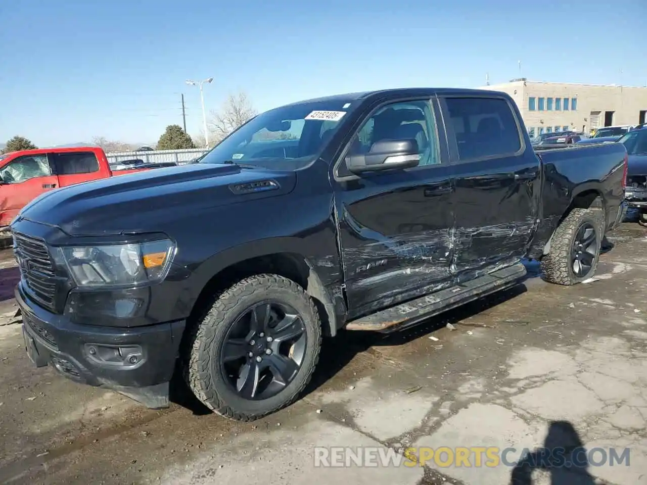 1 Photograph of a damaged car 1C6SRFFT8MN674044 RAM 1500 2021