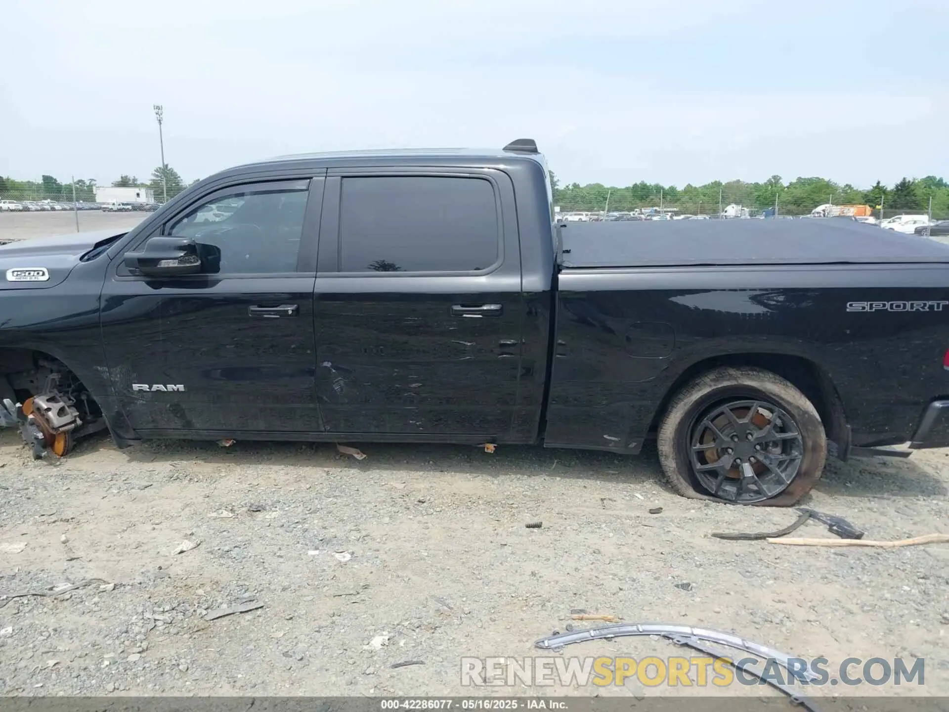 14 Photograph of a damaged car 1C6SRFFT8MN816943 RAM 1500 2021