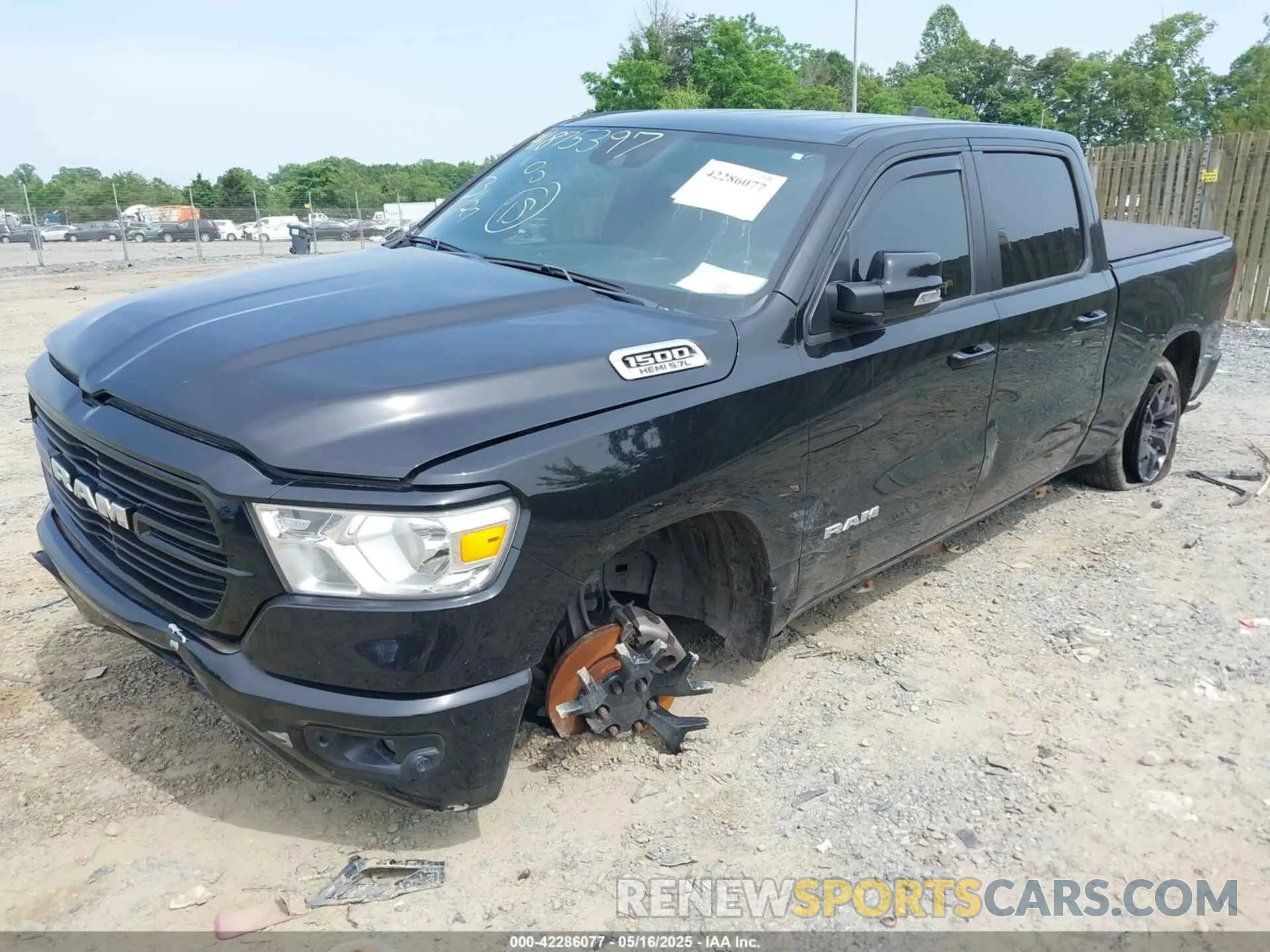 2 Photograph of a damaged car 1C6SRFFT8MN816943 RAM 1500 2021