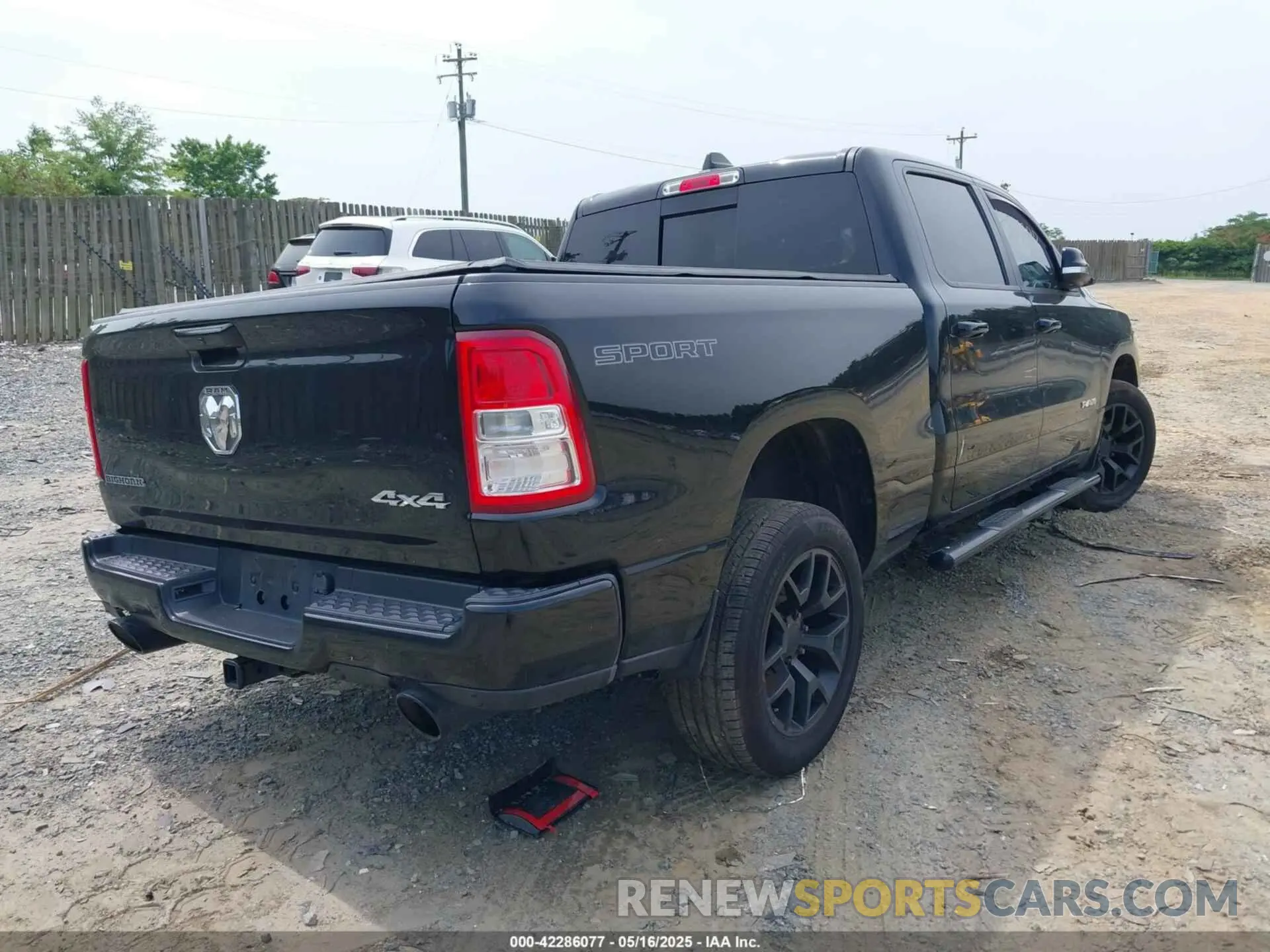 4 Photograph of a damaged car 1C6SRFFT8MN816943 RAM 1500 2021