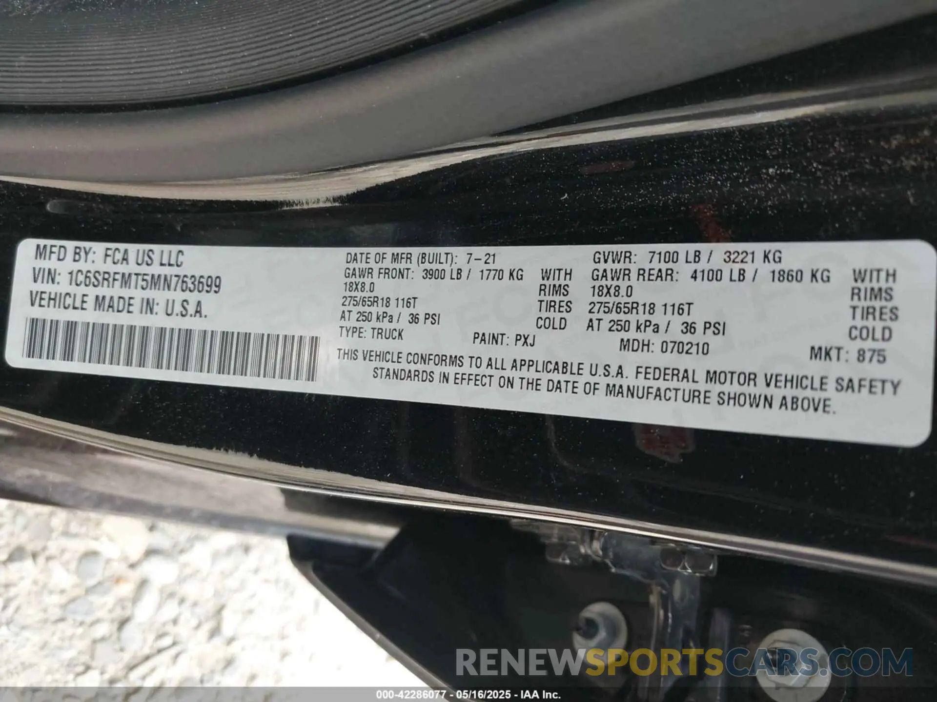 9 Photograph of a damaged car 1C6SRFFT8MN816943 RAM 1500 2021