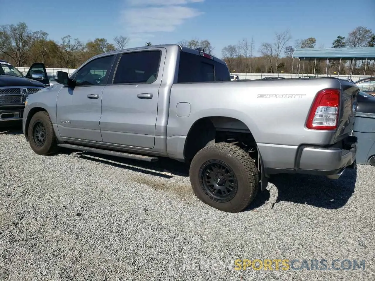 2 Photograph of a damaged car 1C6SRFFT9MN527585 RAM 1500 2021