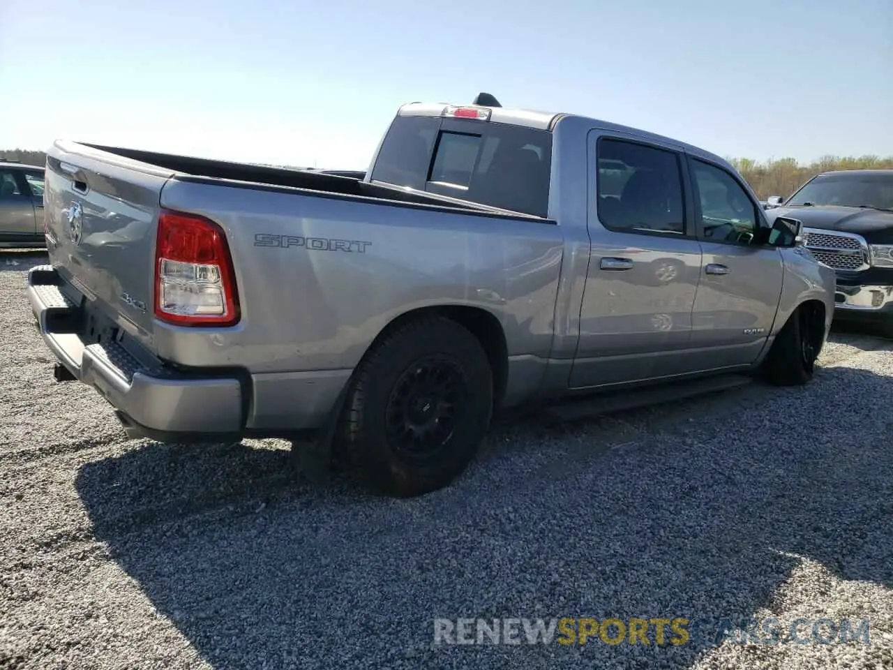 3 Photograph of a damaged car 1C6SRFFT9MN527585 RAM 1500 2021