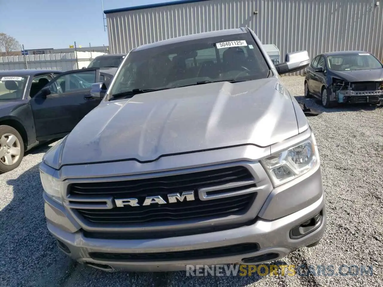 5 Photograph of a damaged car 1C6SRFFT9MN527585 RAM 1500 2021