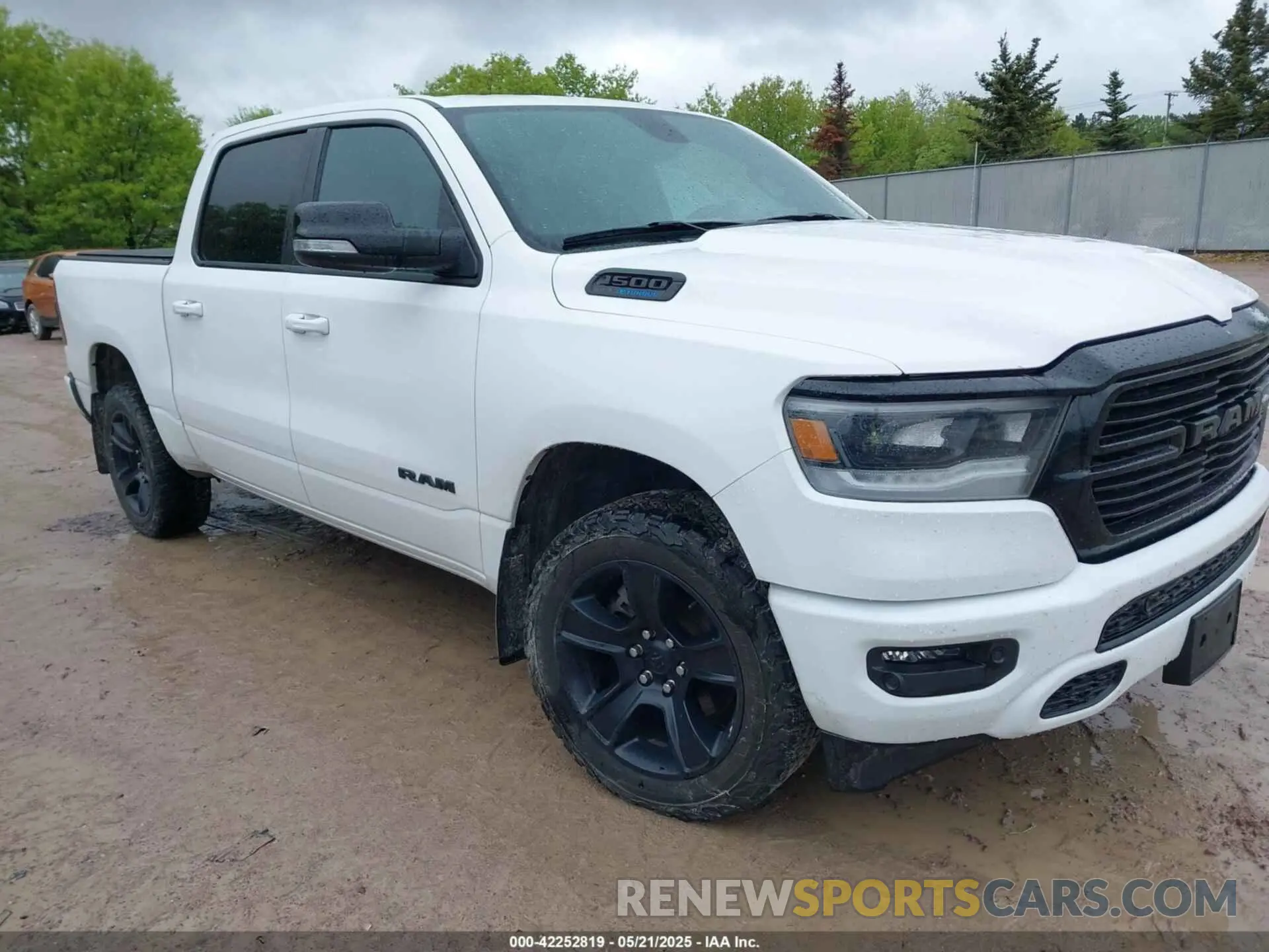 1 Photograph of a damaged car 1C6SRFFT9MN534553 RAM 1500 2021