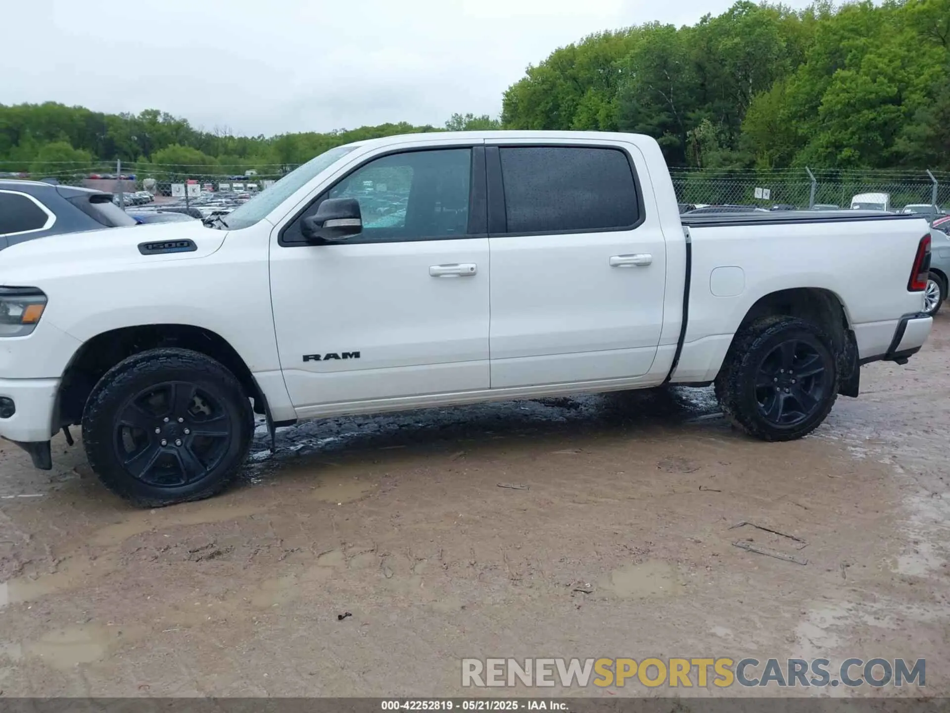 14 Photograph of a damaged car 1C6SRFFT9MN534553 RAM 1500 2021