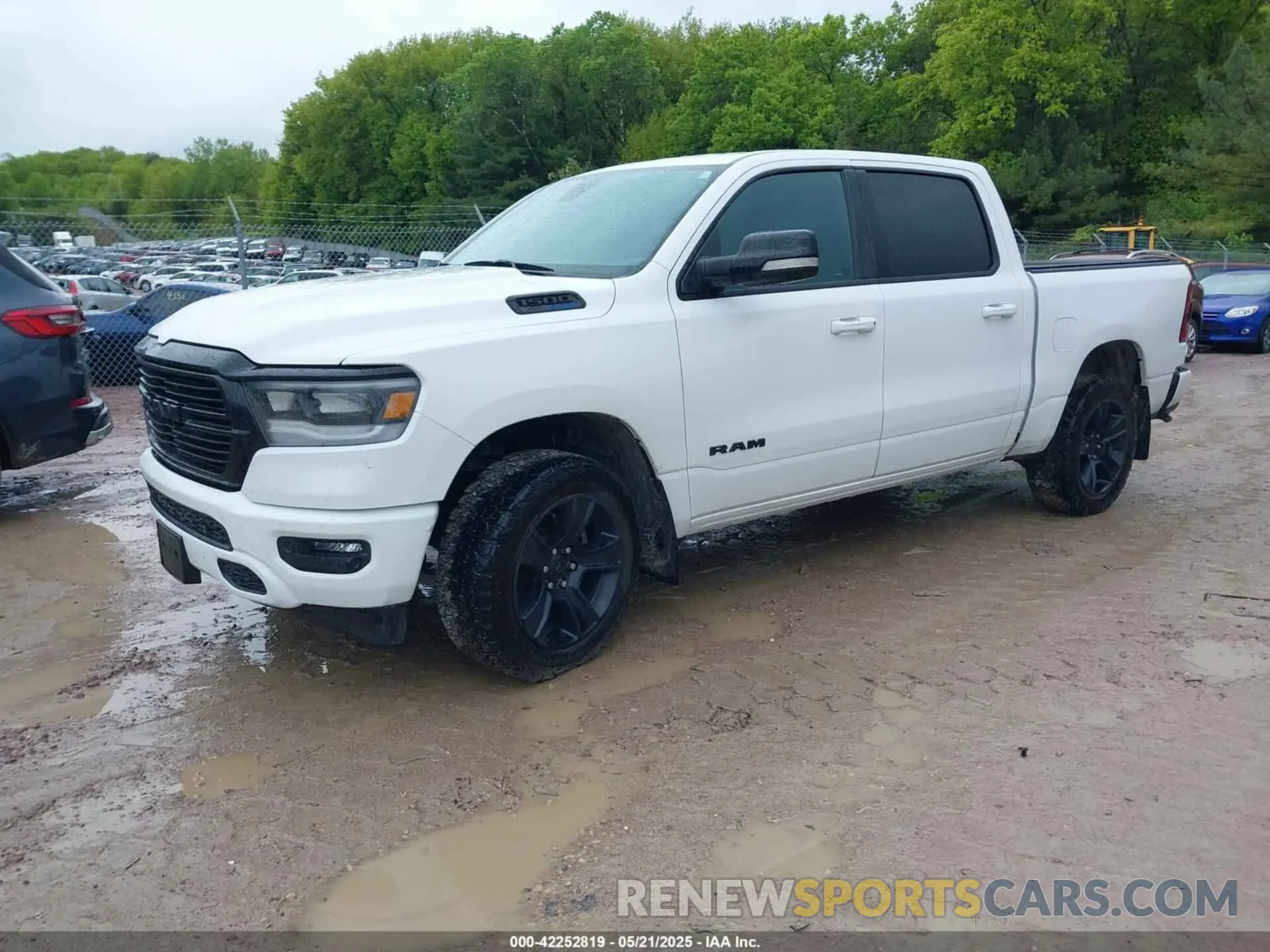2 Photograph of a damaged car 1C6SRFFT9MN534553 RAM 1500 2021