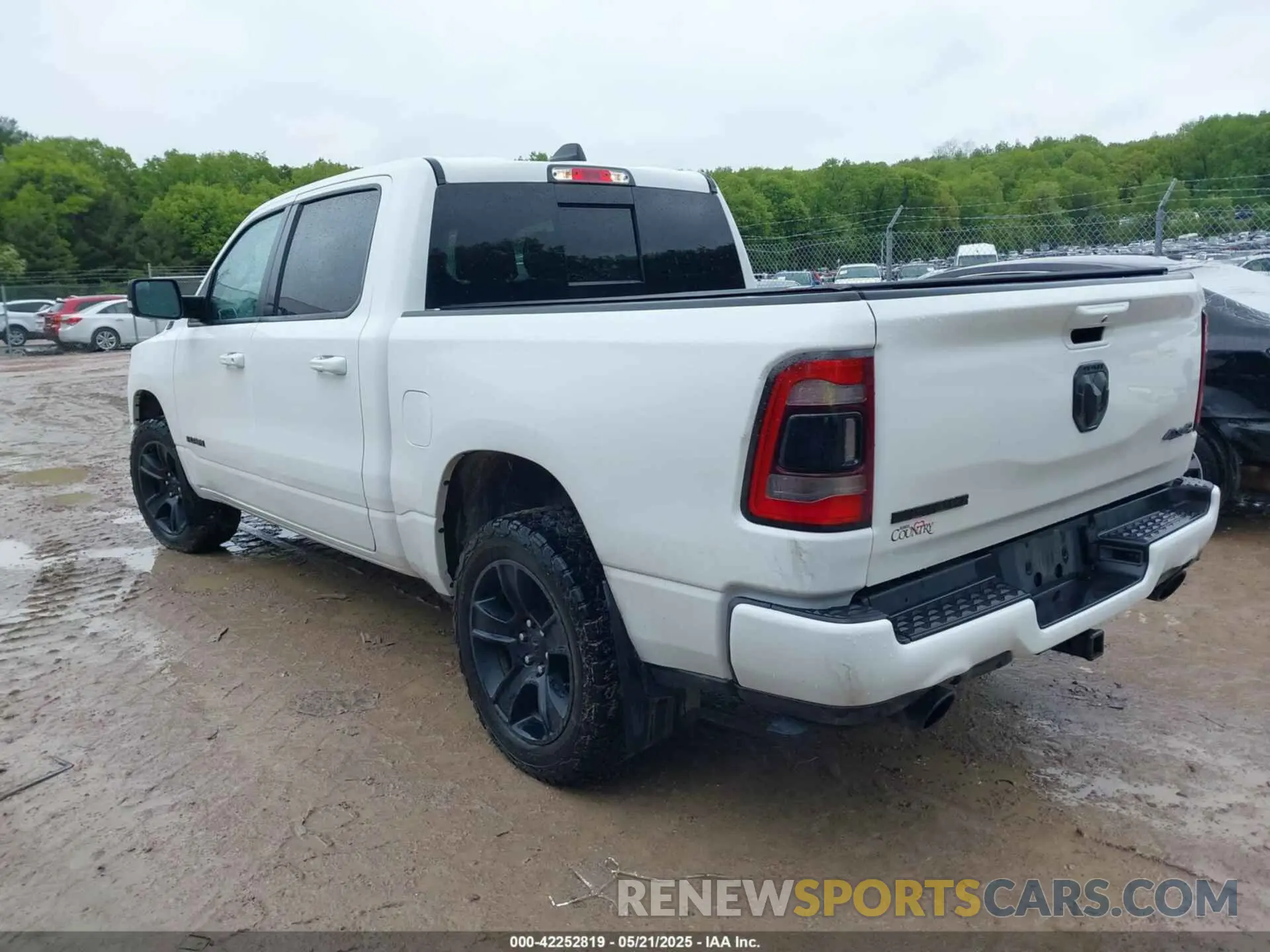 3 Photograph of a damaged car 1C6SRFFT9MN534553 RAM 1500 2021