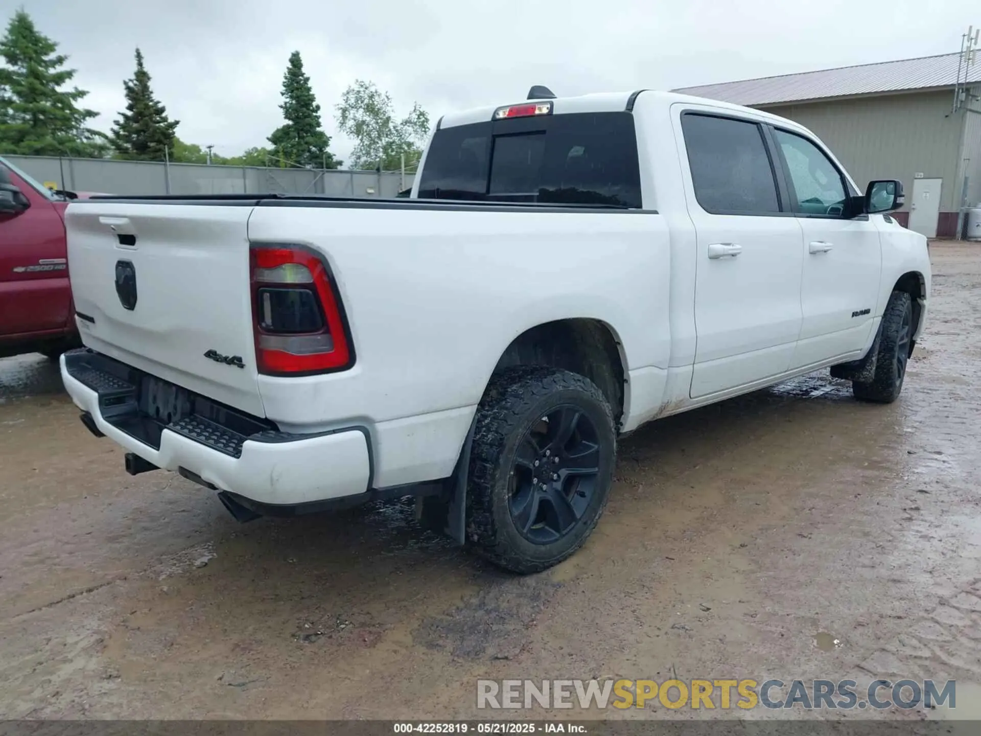 4 Photograph of a damaged car 1C6SRFFT9MN534553 RAM 1500 2021