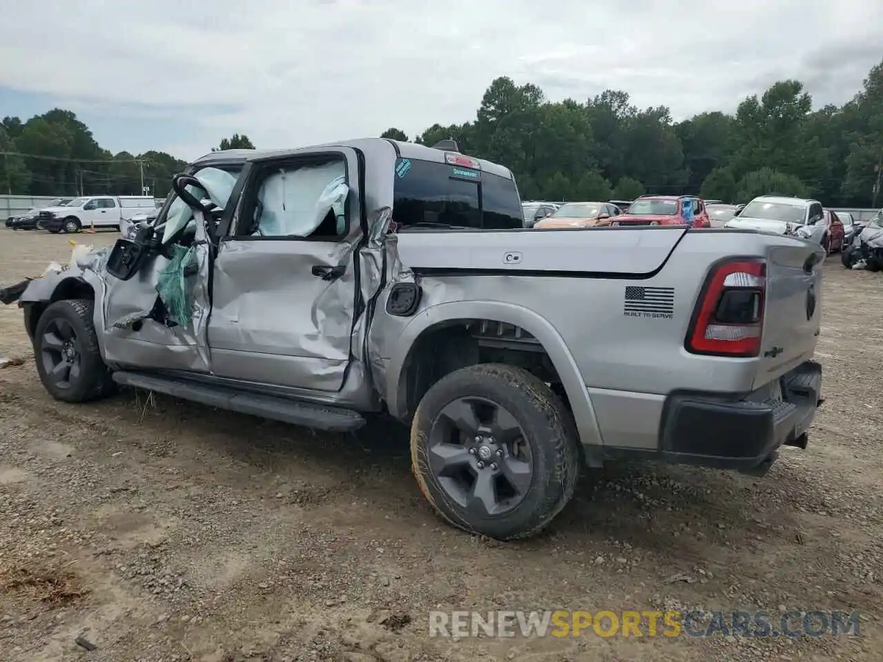 2 Photograph of a damaged car 1C6SRFFT9MN557167 RAM 1500 2021