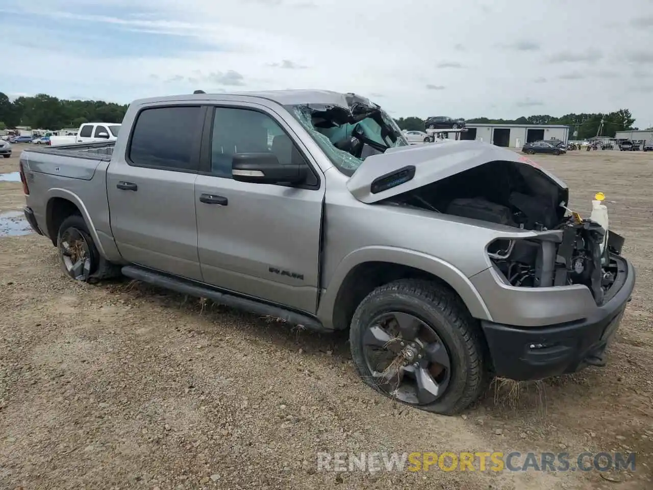 4 Photograph of a damaged car 1C6SRFFT9MN557167 RAM 1500 2021