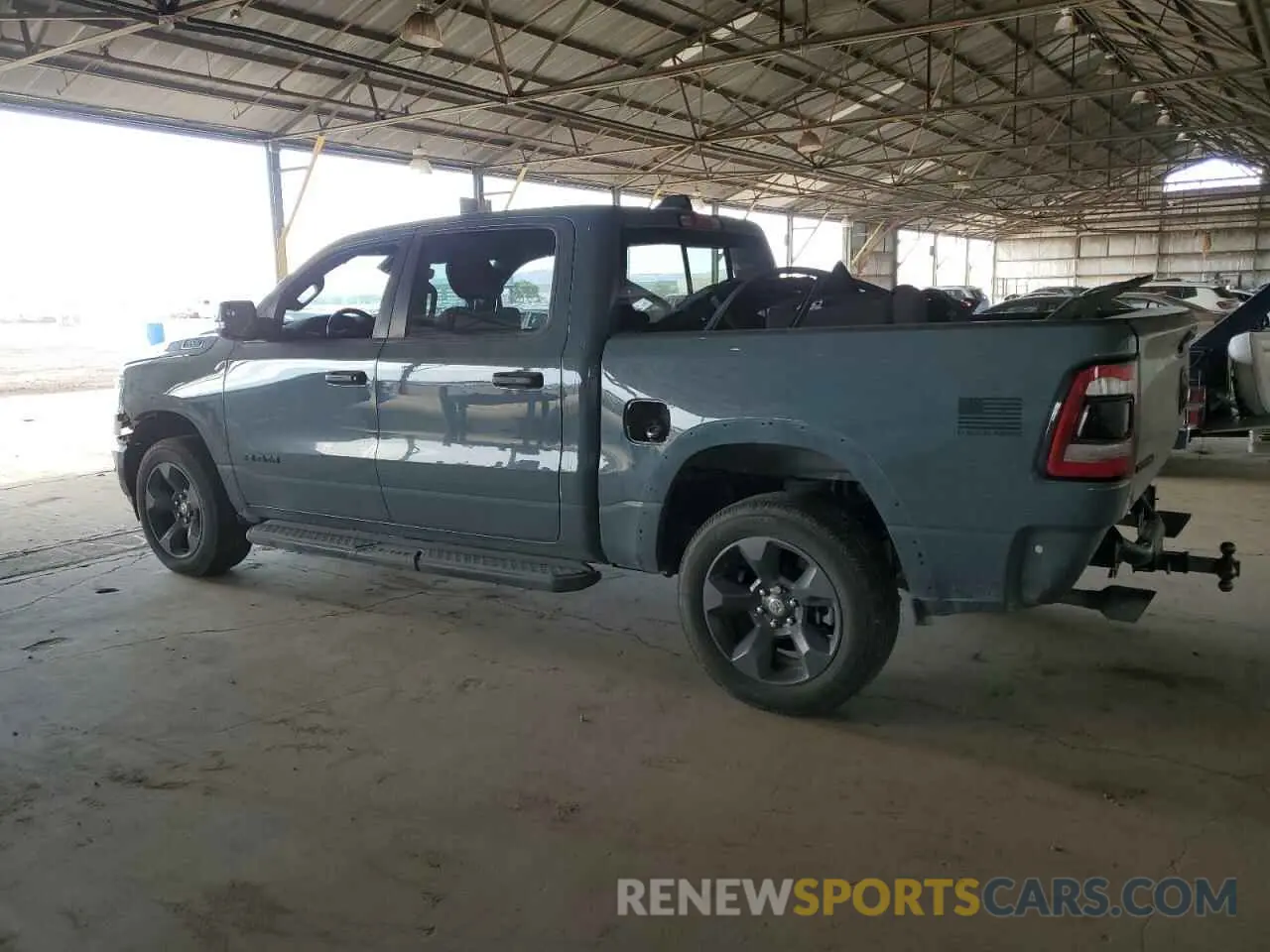 2 Photograph of a damaged car 1C6SRFFT9MN562627 RAM 1500 2021