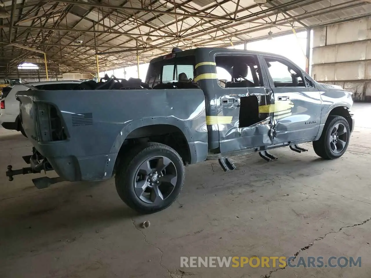 3 Photograph of a damaged car 1C6SRFFT9MN562627 RAM 1500 2021