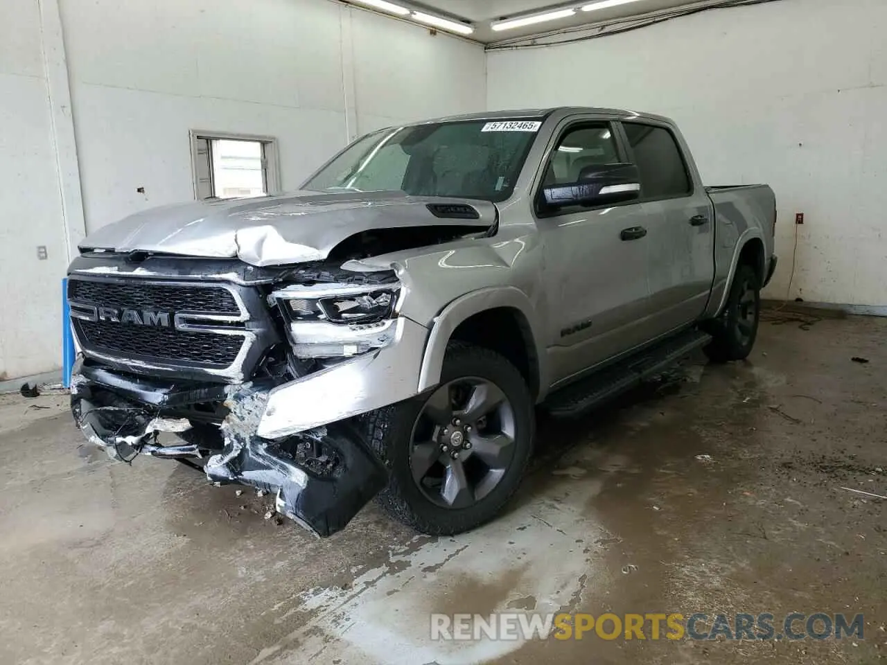 1 Photograph of a damaged car 1C6SRFFT9MN577418 RAM 1500 2021