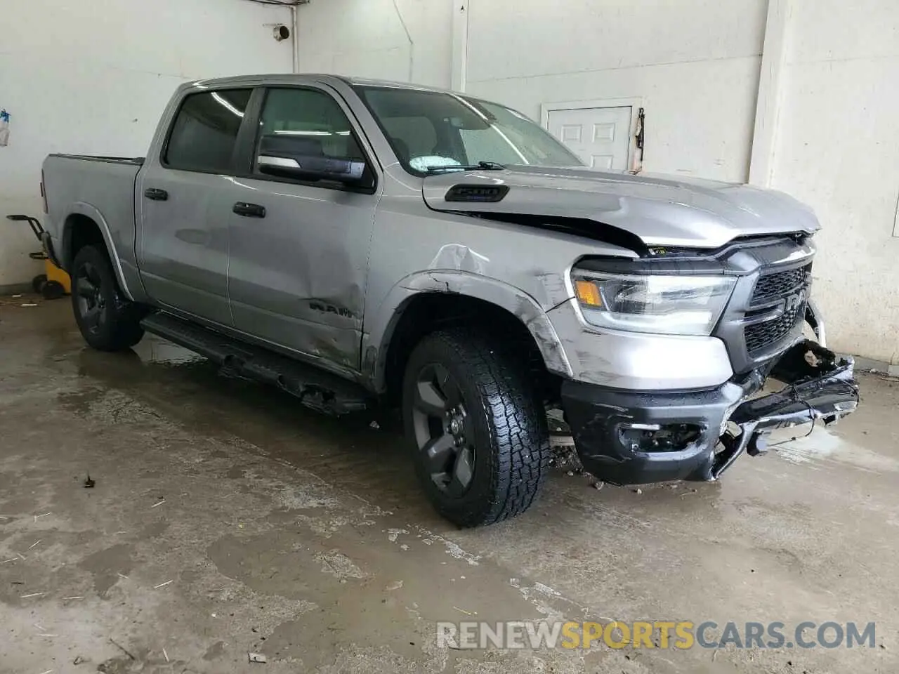 4 Photograph of a damaged car 1C6SRFFT9MN577418 RAM 1500 2021