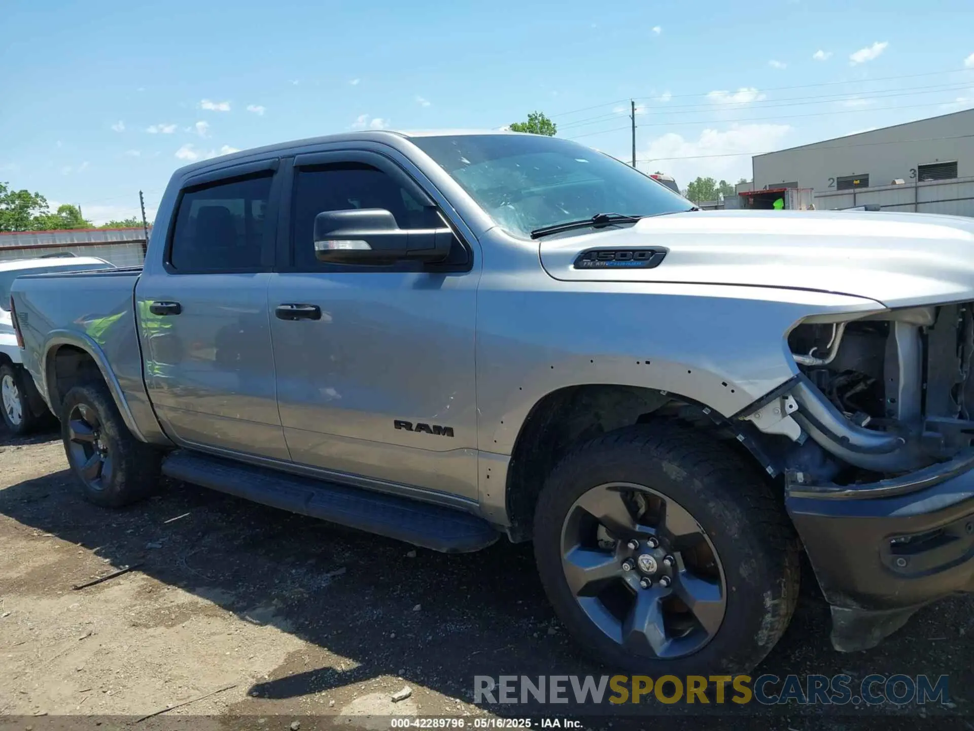 14 Photograph of a damaged car 1C6SRFFT9MN577936 RAM 1500 2021
