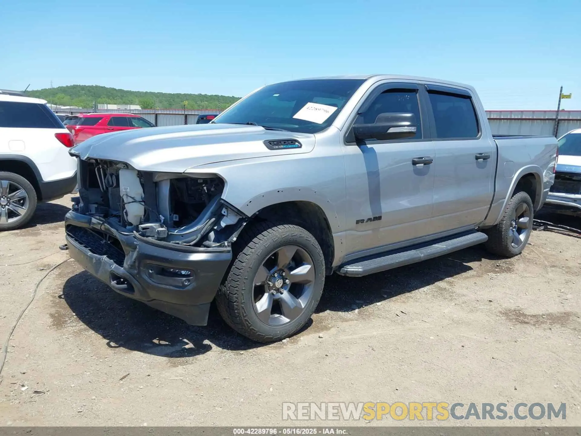 2 Photograph of a damaged car 1C6SRFFT9MN577936 RAM 1500 2021