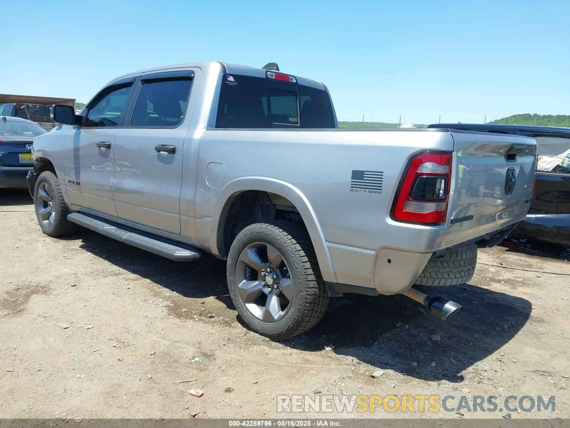 3 Photograph of a damaged car 1C6SRFFT9MN577936 RAM 1500 2021