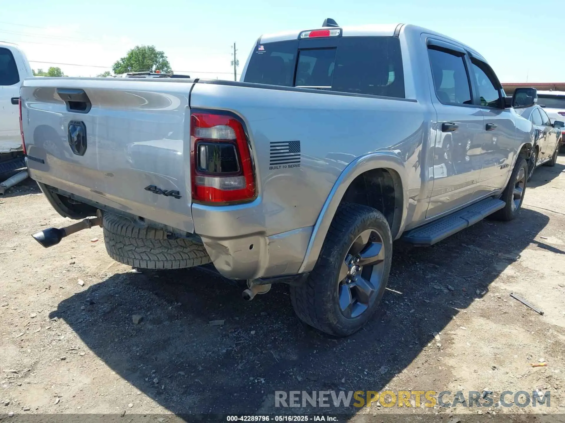 4 Photograph of a damaged car 1C6SRFFT9MN577936 RAM 1500 2021