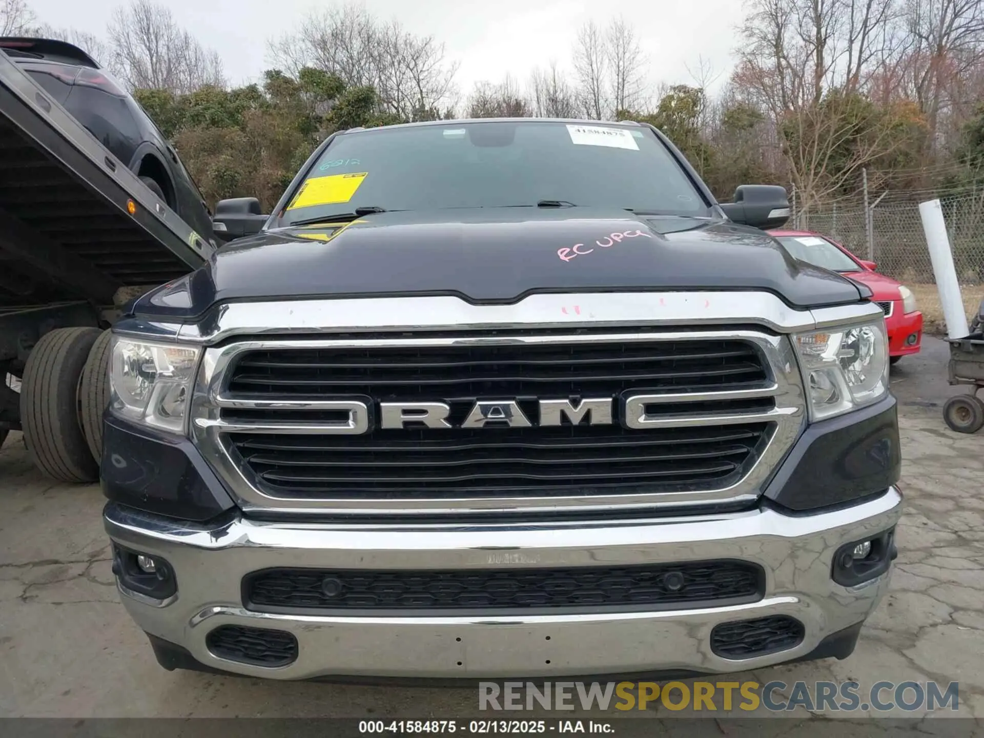 12 Photograph of a damaged car 1C6SRFFT9MN618341 RAM 1500 2021