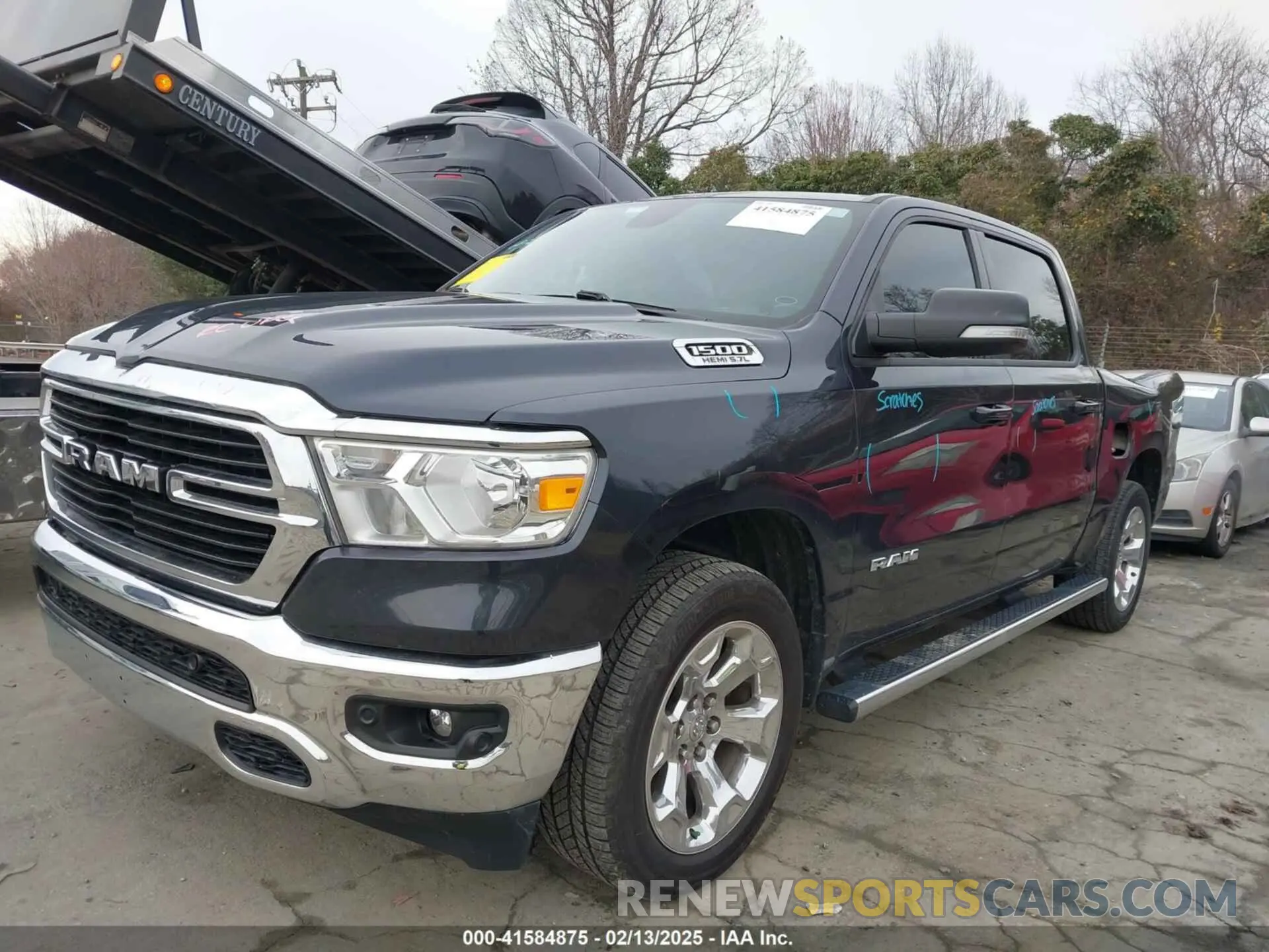 2 Photograph of a damaged car 1C6SRFFT9MN618341 RAM 1500 2021