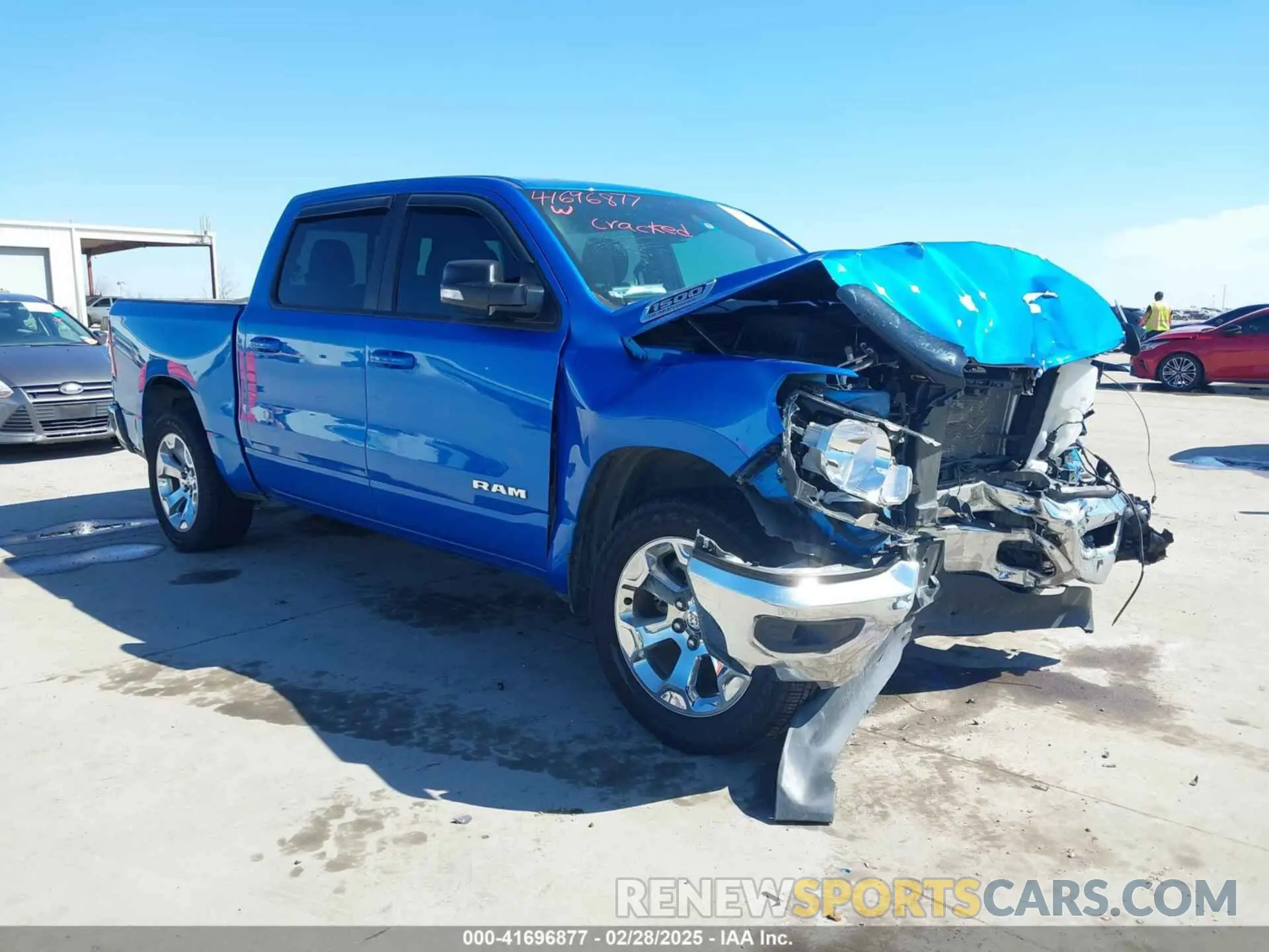 1 Photograph of a damaged car 1C6SRFFT9MN643370 RAM 1500 2021