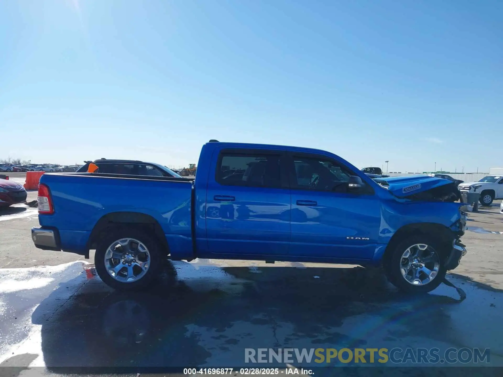 14 Photograph of a damaged car 1C6SRFFT9MN643370 RAM 1500 2021