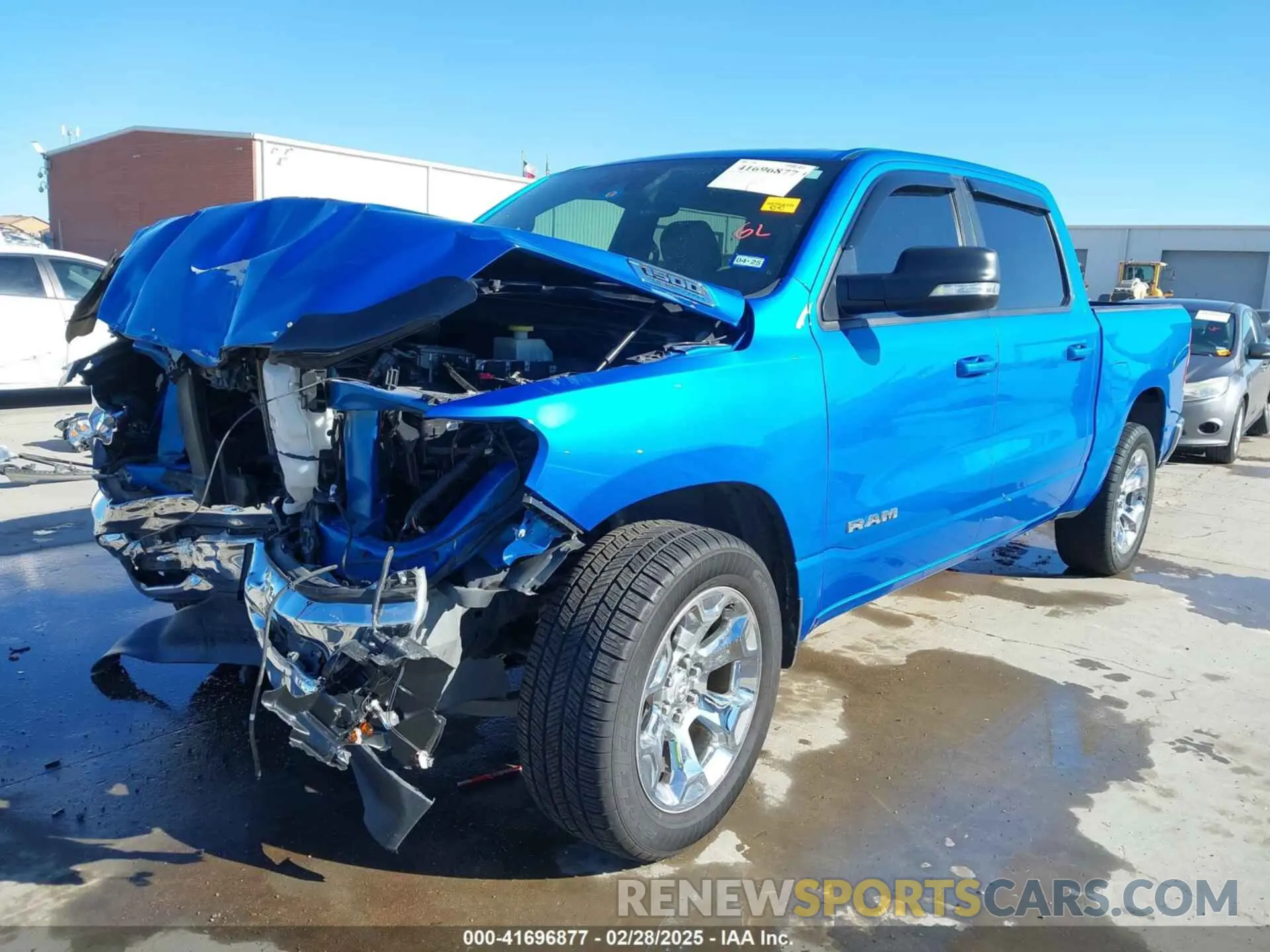 2 Photograph of a damaged car 1C6SRFFT9MN643370 RAM 1500 2021