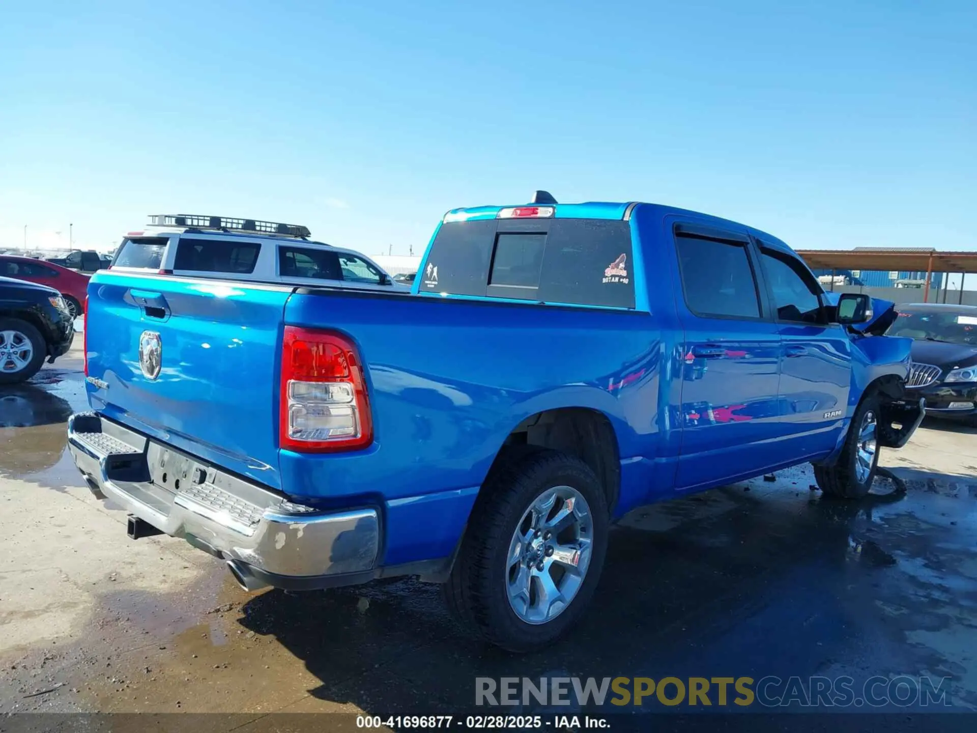 4 Photograph of a damaged car 1C6SRFFT9MN643370 RAM 1500 2021
