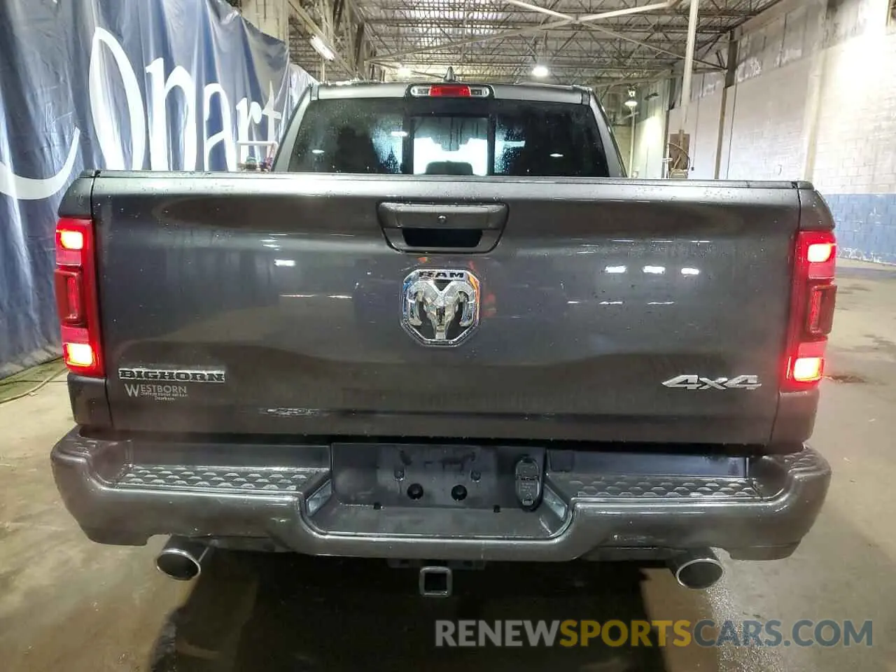 6 Photograph of a damaged car 1C6SRFFT9MN647970 RAM 1500 2021