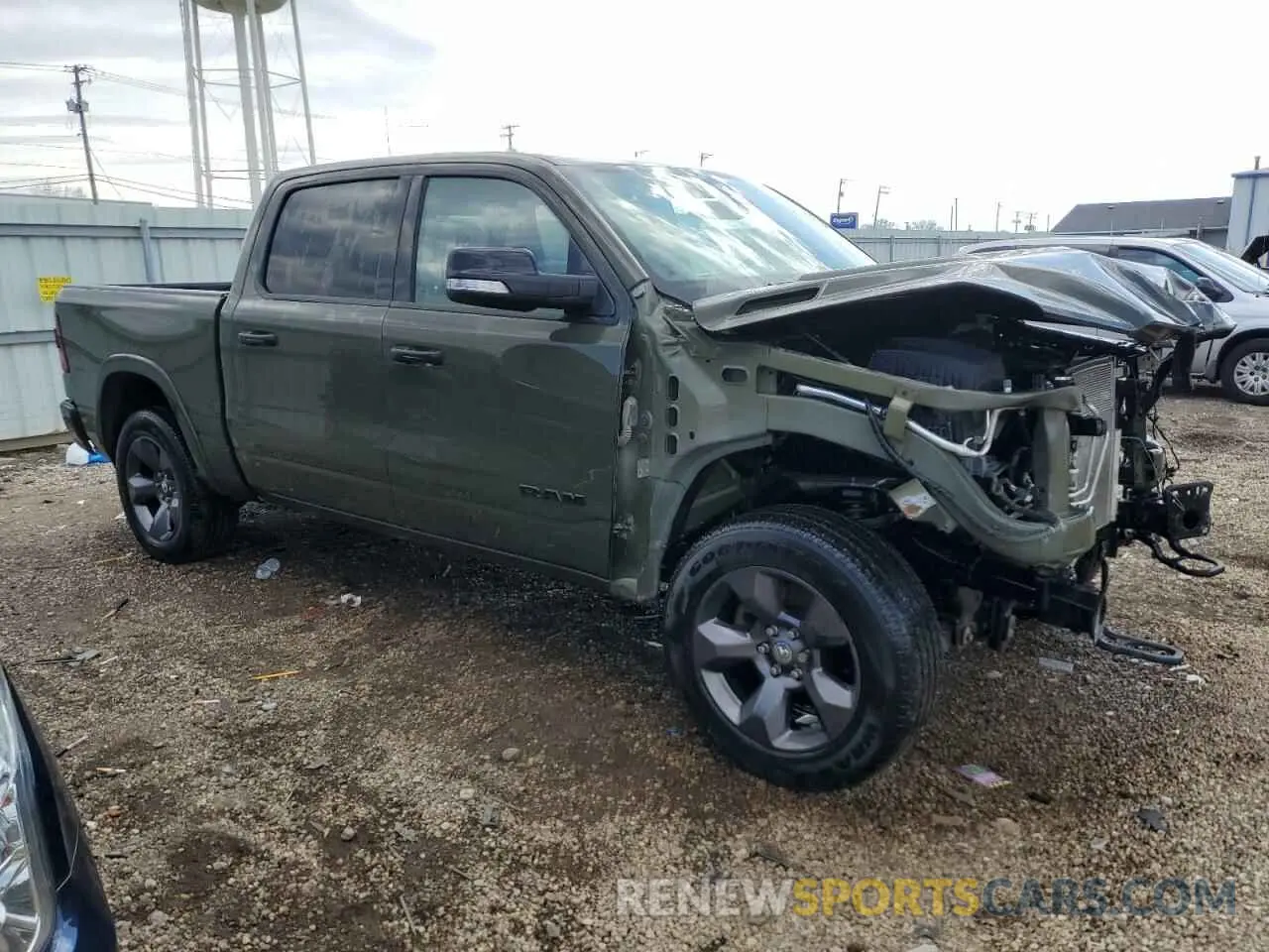 4 Photograph of a damaged car 1C6SRFFT9MN662288 RAM 1500 2021