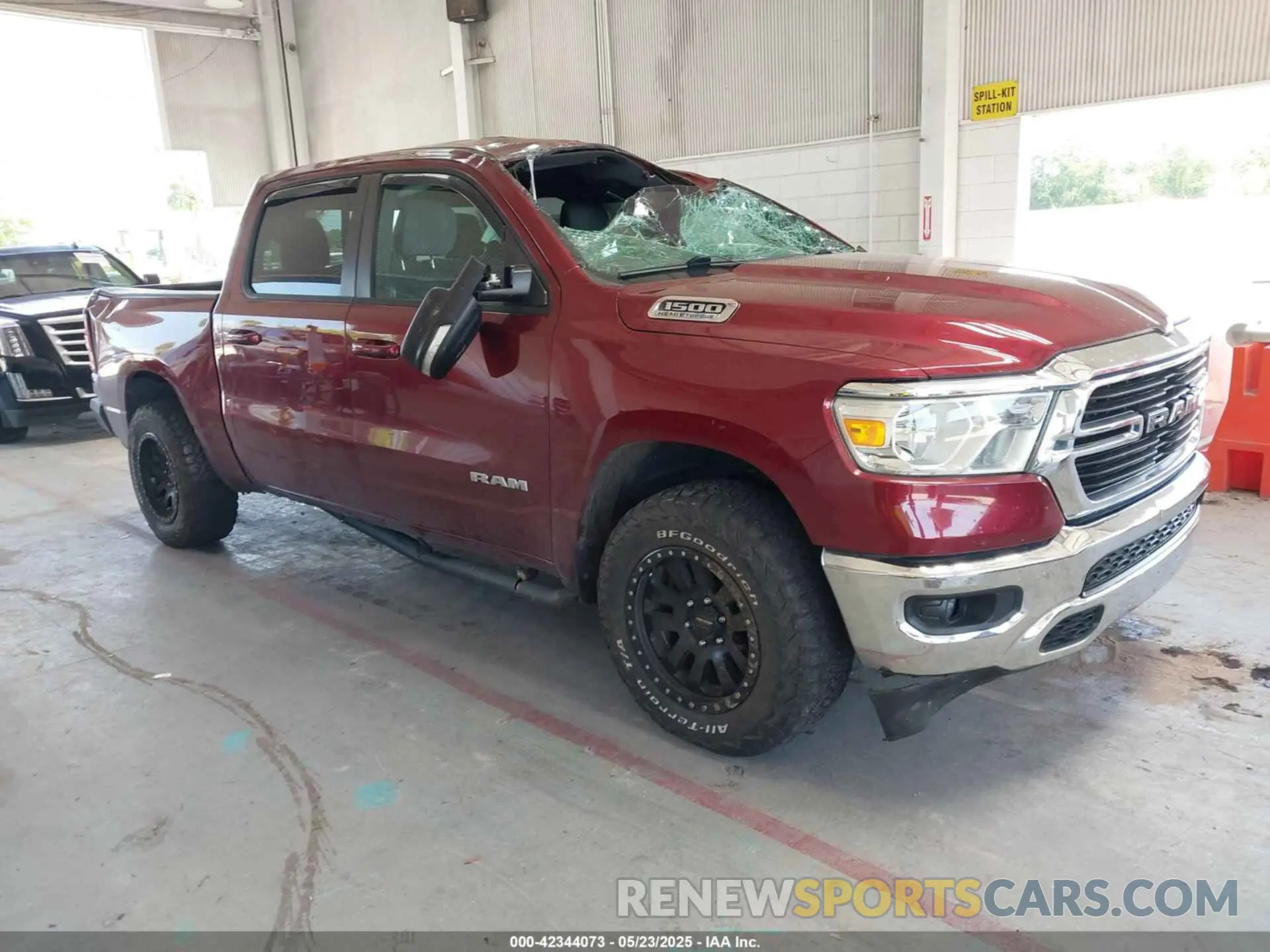 1 Photograph of a damaged car 1C6SRFFT9MN676871 RAM 1500 2021