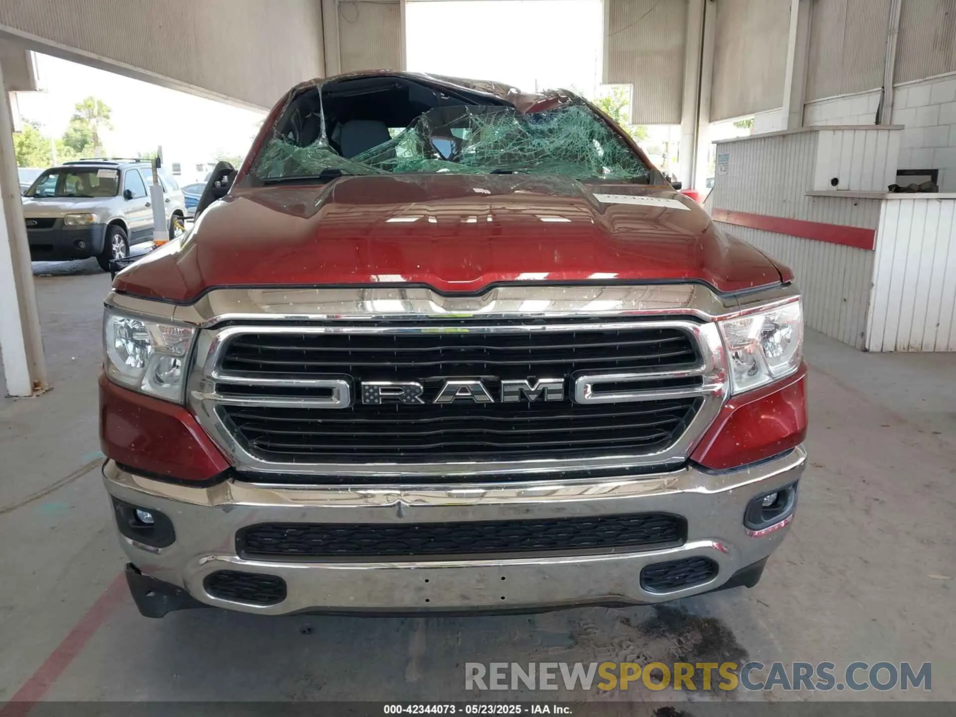 12 Photograph of a damaged car 1C6SRFFT9MN676871 RAM 1500 2021