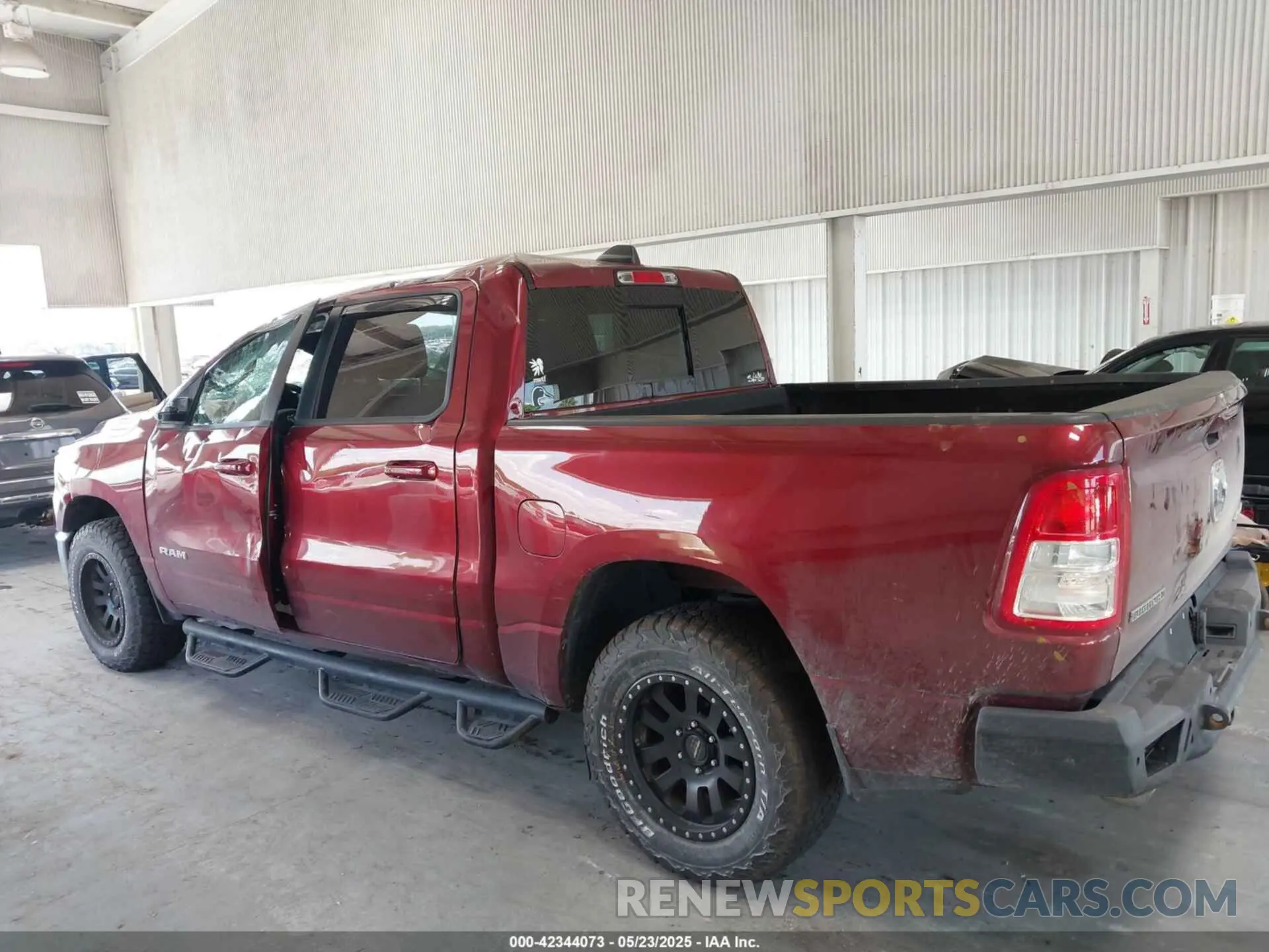 14 Photograph of a damaged car 1C6SRFFT9MN676871 RAM 1500 2021