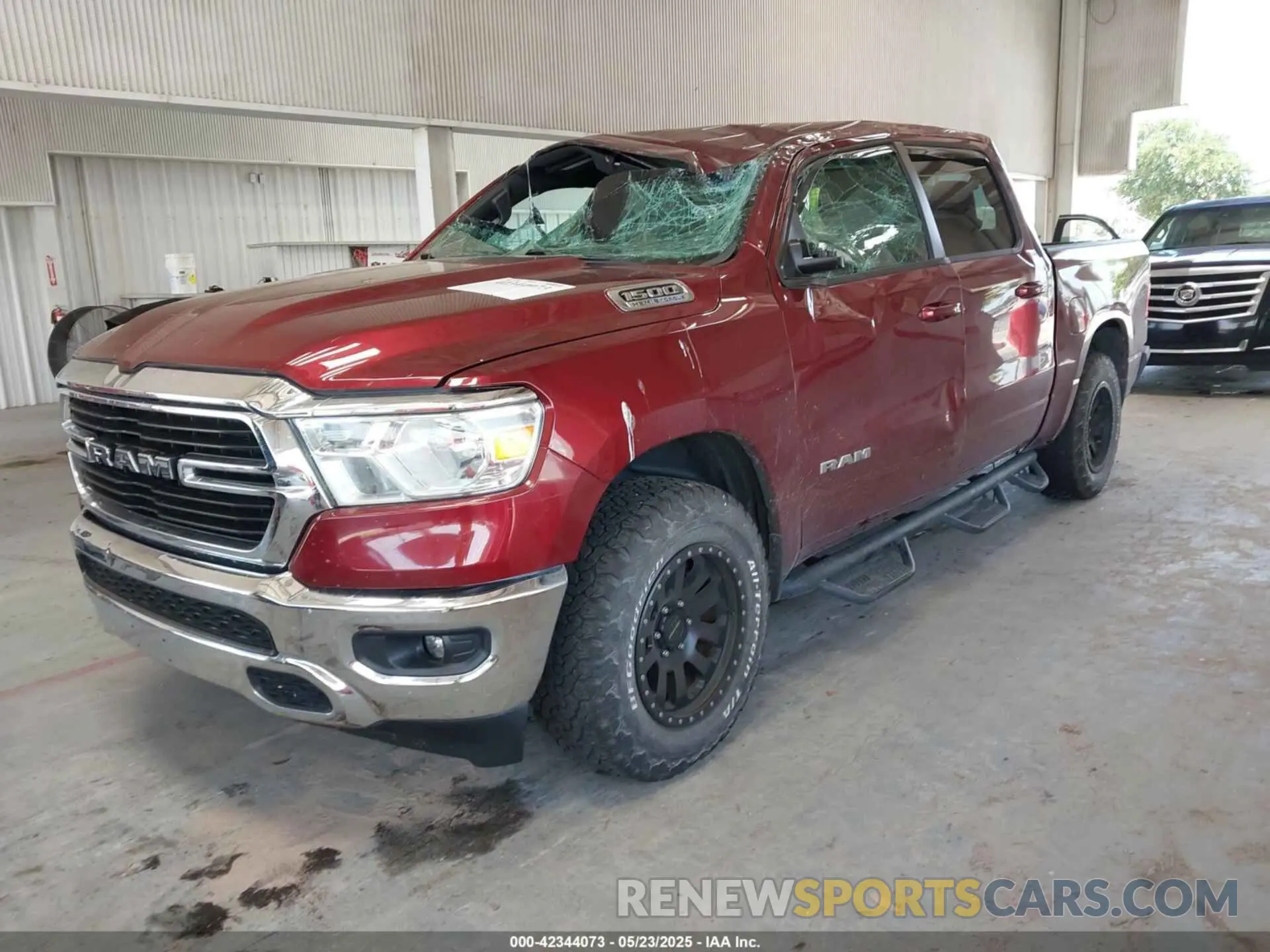 2 Photograph of a damaged car 1C6SRFFT9MN676871 RAM 1500 2021
