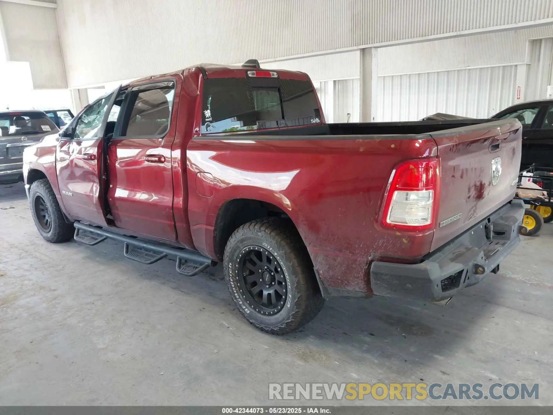 3 Photograph of a damaged car 1C6SRFFT9MN676871 RAM 1500 2021