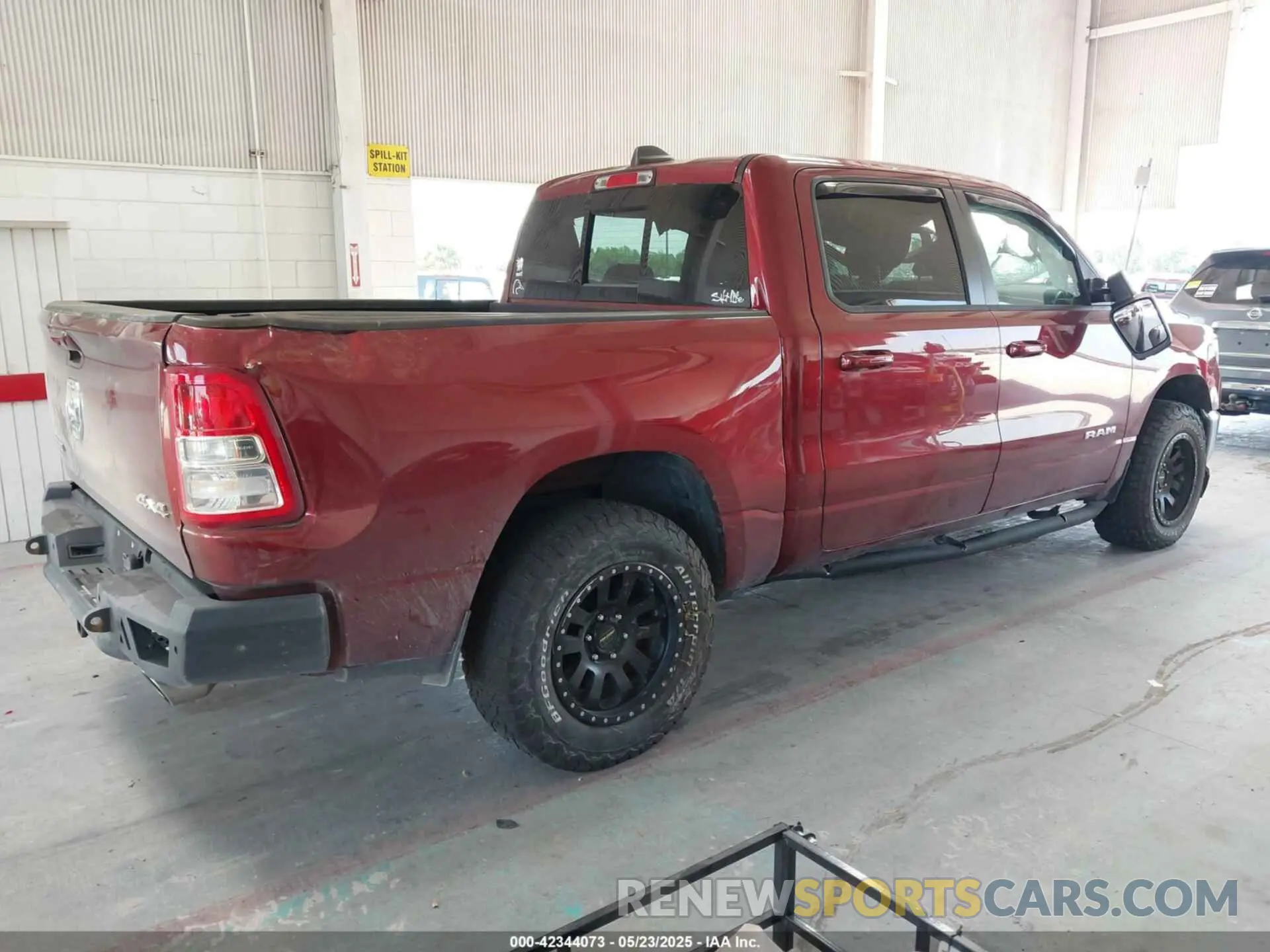 4 Photograph of a damaged car 1C6SRFFT9MN676871 RAM 1500 2021