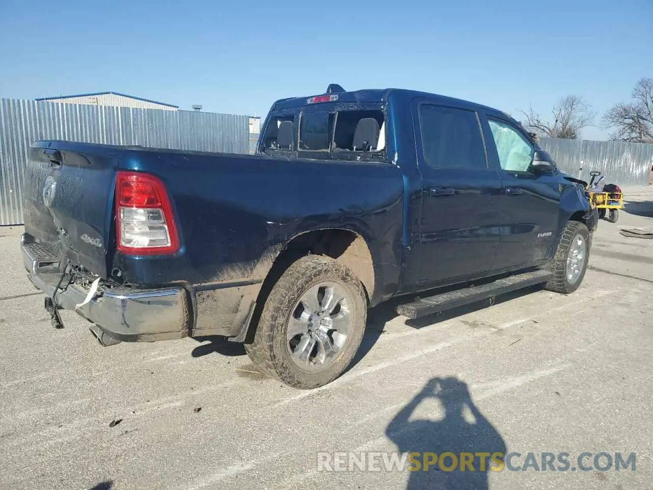 3 Photograph of a damaged car 1C6SRFFT9MN692262 RAM 1500 2021