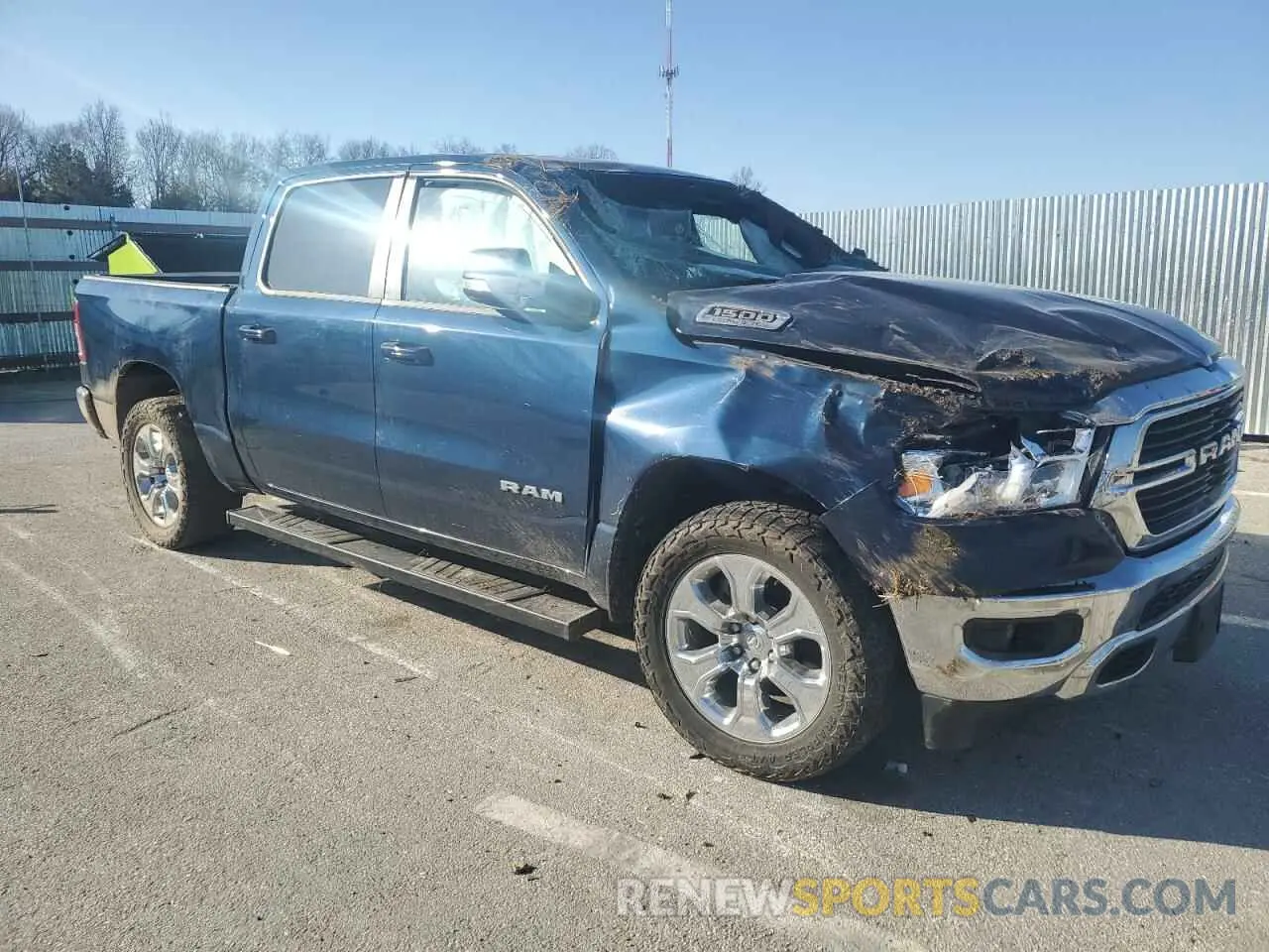 4 Photograph of a damaged car 1C6SRFFT9MN692262 RAM 1500 2021