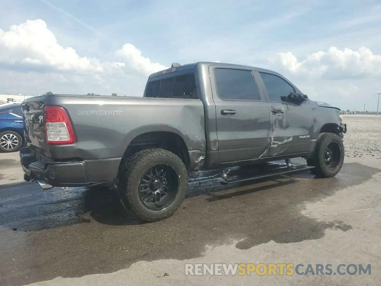3 Photograph of a damaged car 1C6SRFFT9MN719847 RAM 1500 2021