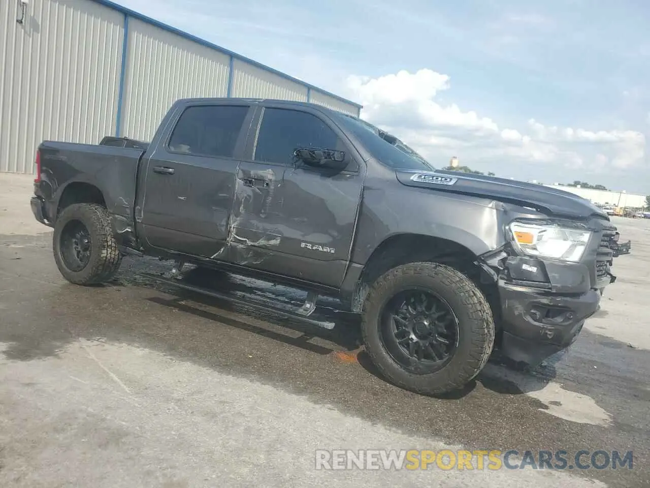 4 Photograph of a damaged car 1C6SRFFT9MN719847 RAM 1500 2021